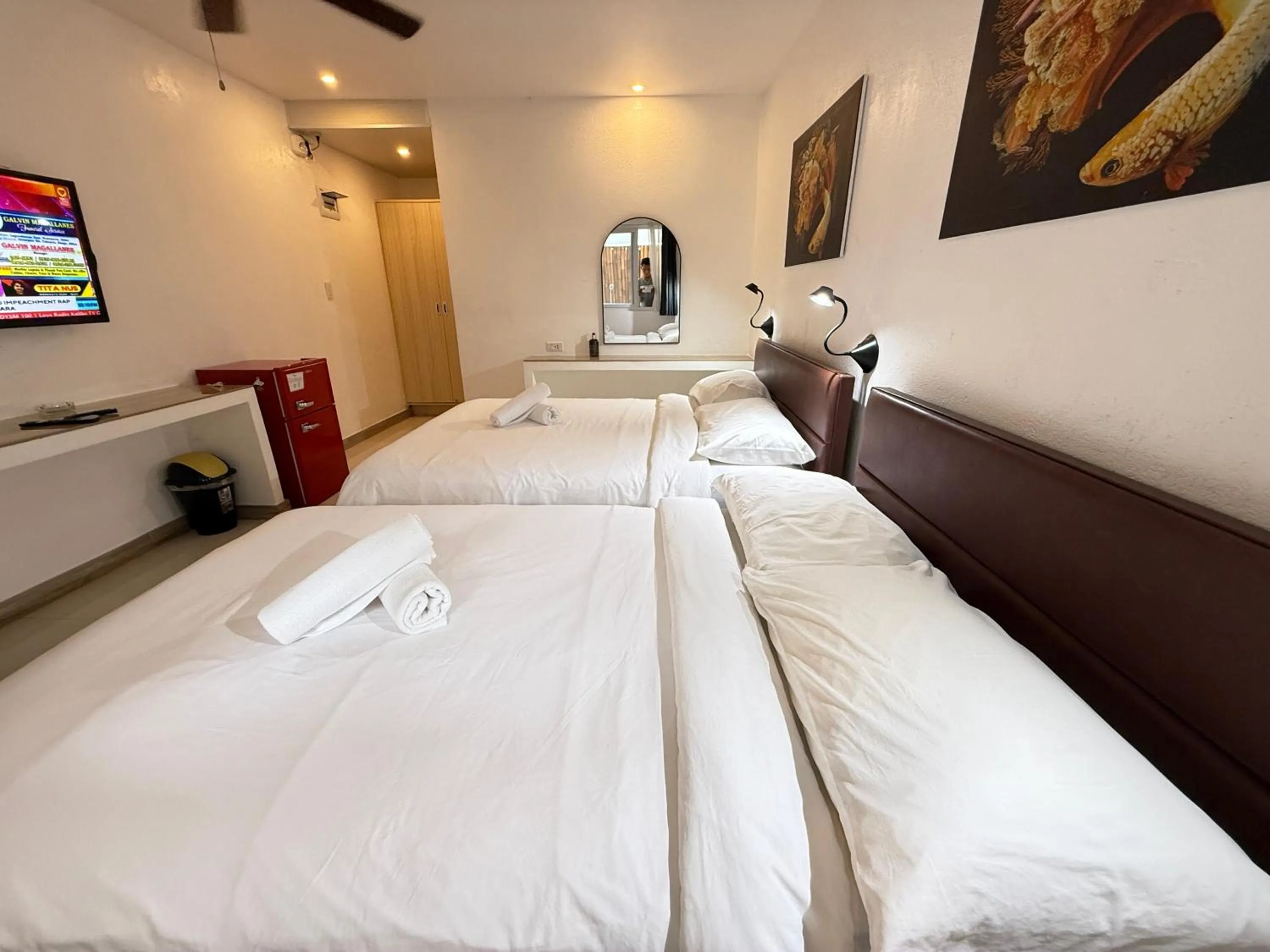 Bed in Calypso Beach and Dive Resort