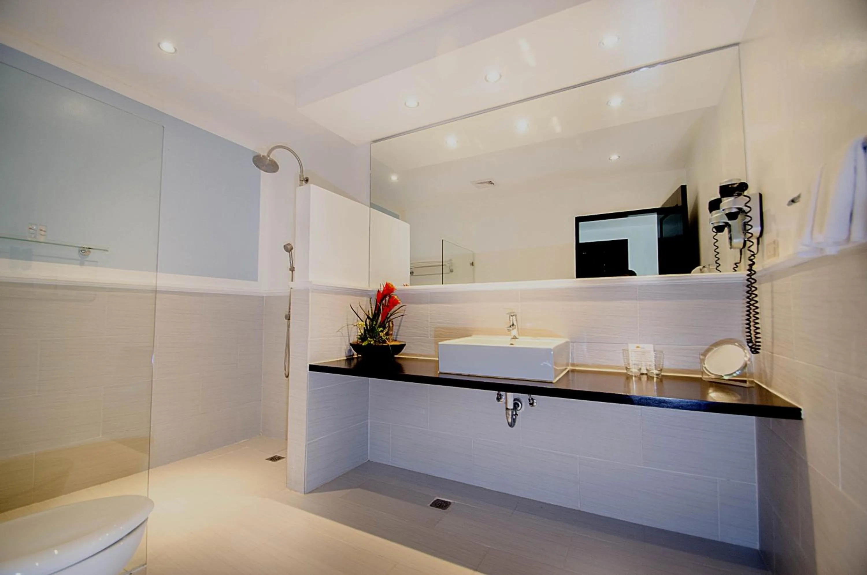 Bathroom in Calypso Beach and Dive Resort