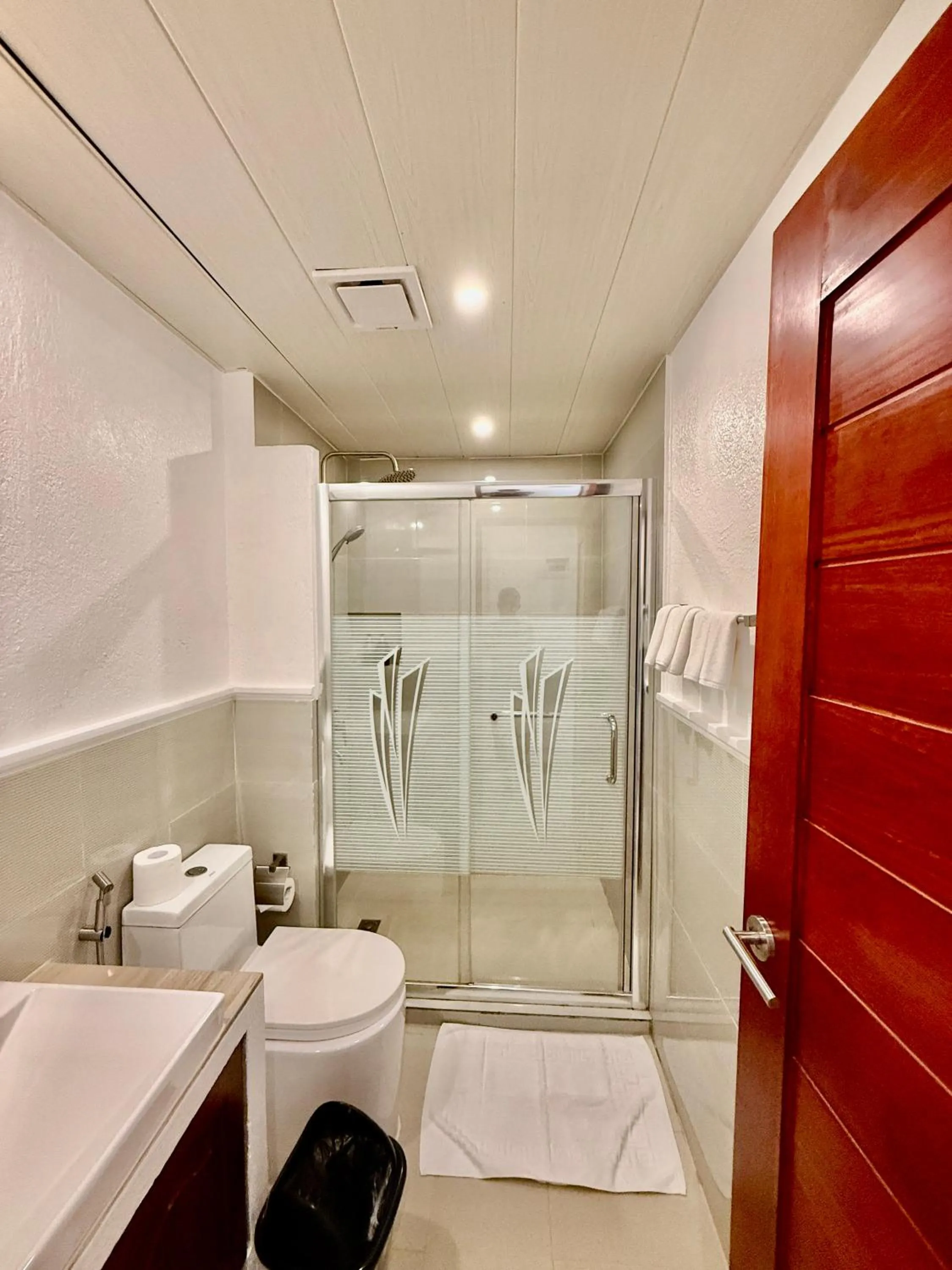 Bathroom in Calypso Beach and Dive Resort