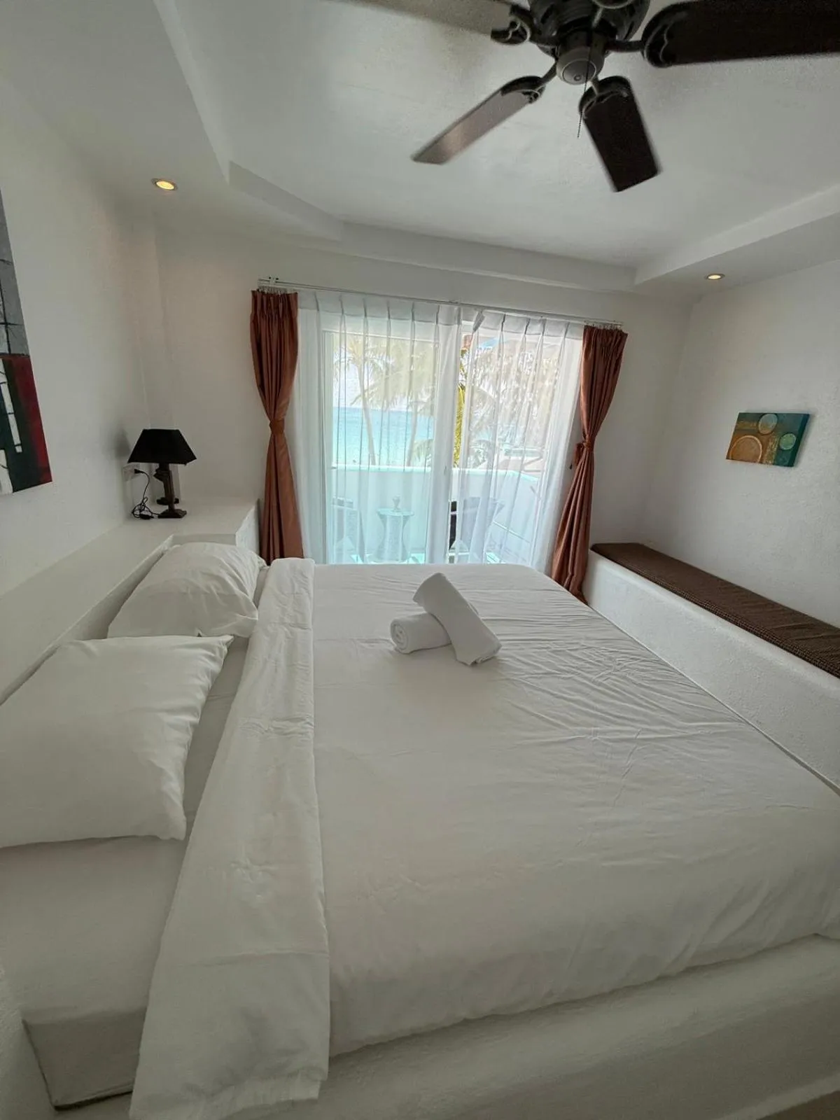 Bedroom, Bed in Calypso Beach and Dive Resort