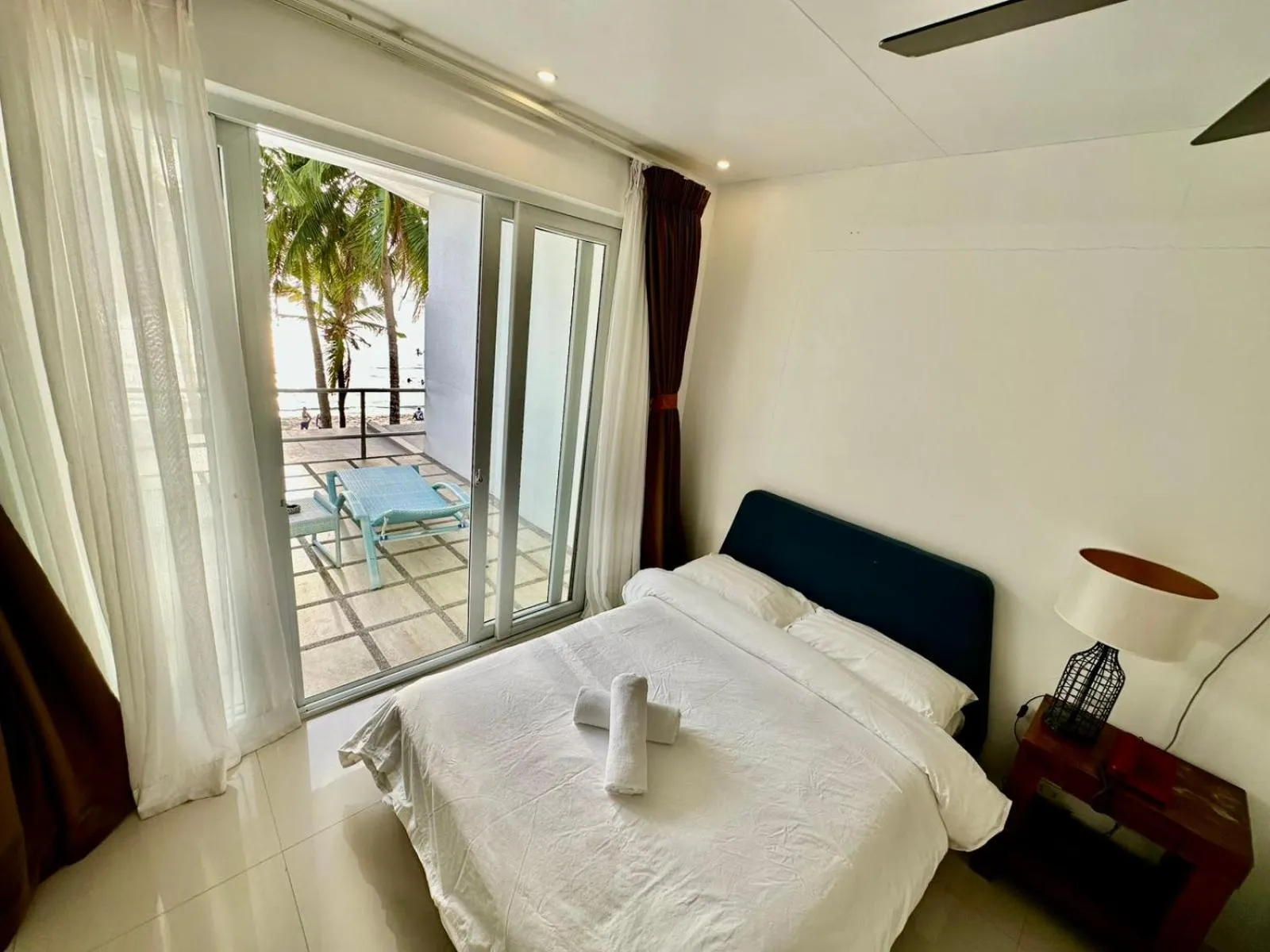 Bed in Calypso Beach and Dive Resort