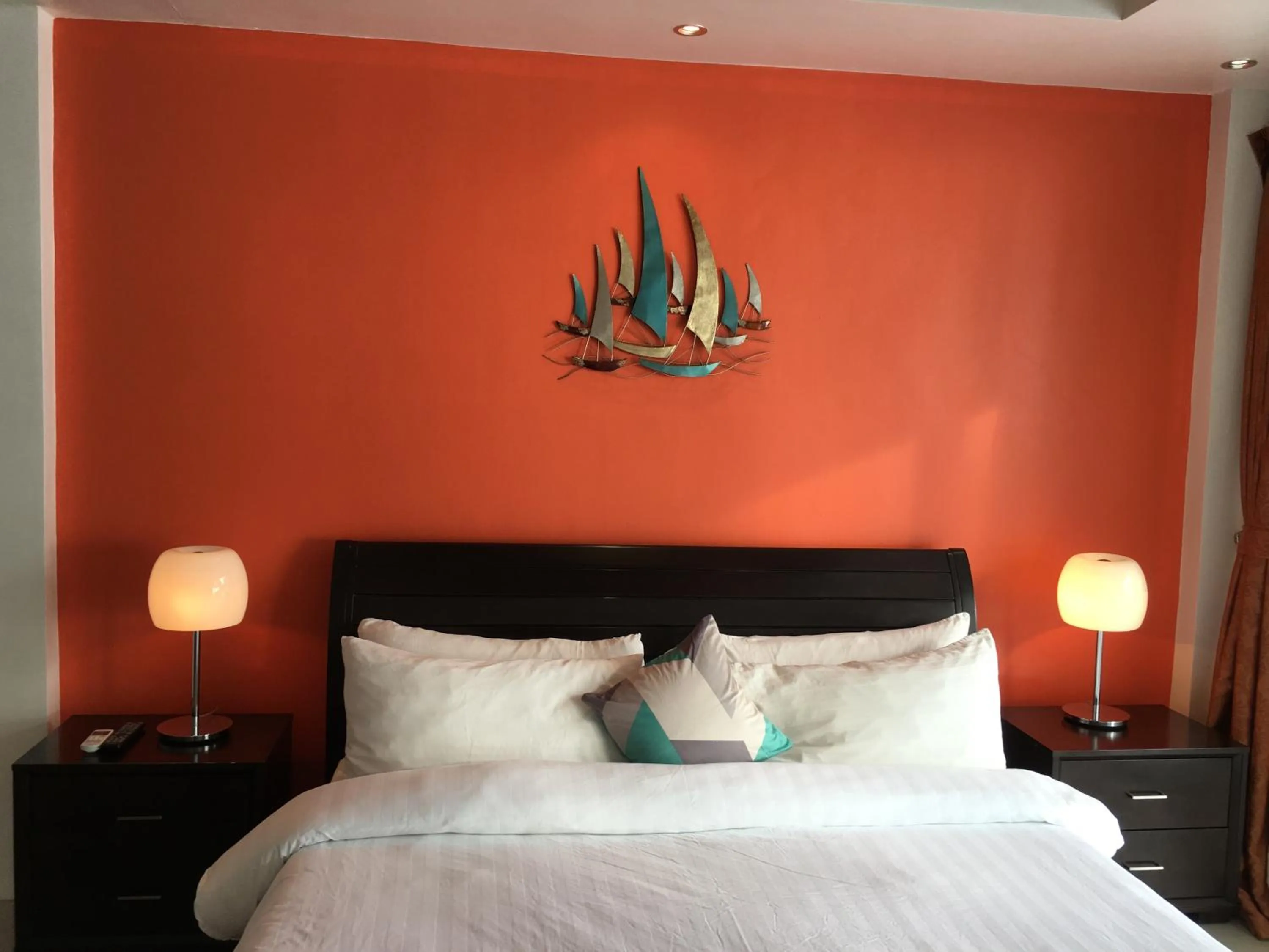 Bed in Calypso Beach and Dive Resort