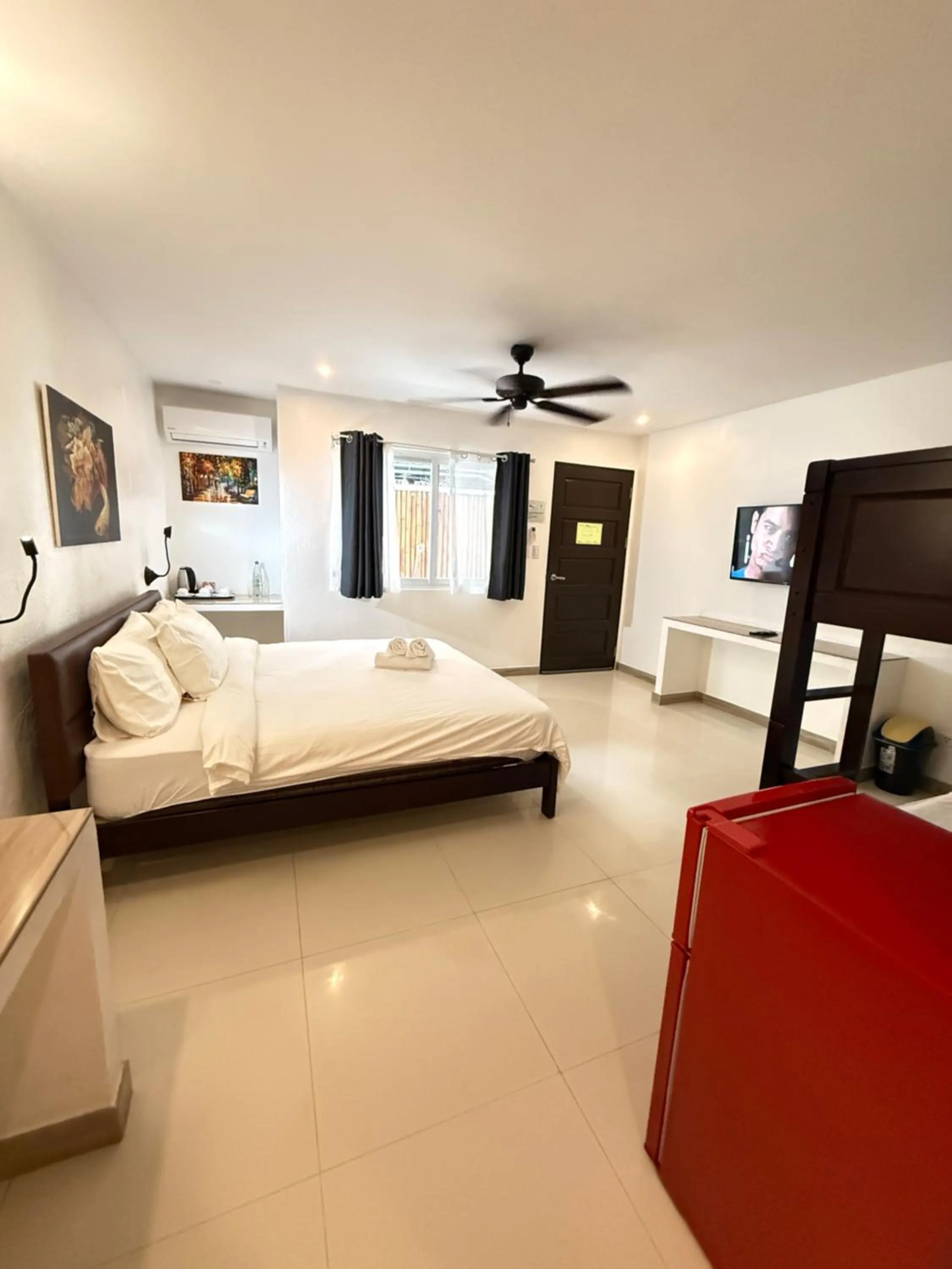 Bedroom, Bed in Calypso Beach and Dive Resort