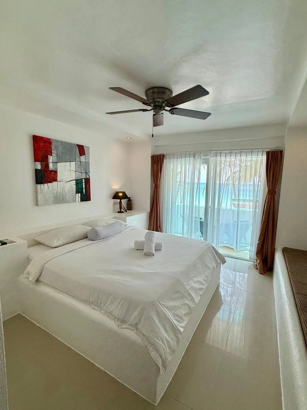 Bed in Calypso Beach and Dive Resort