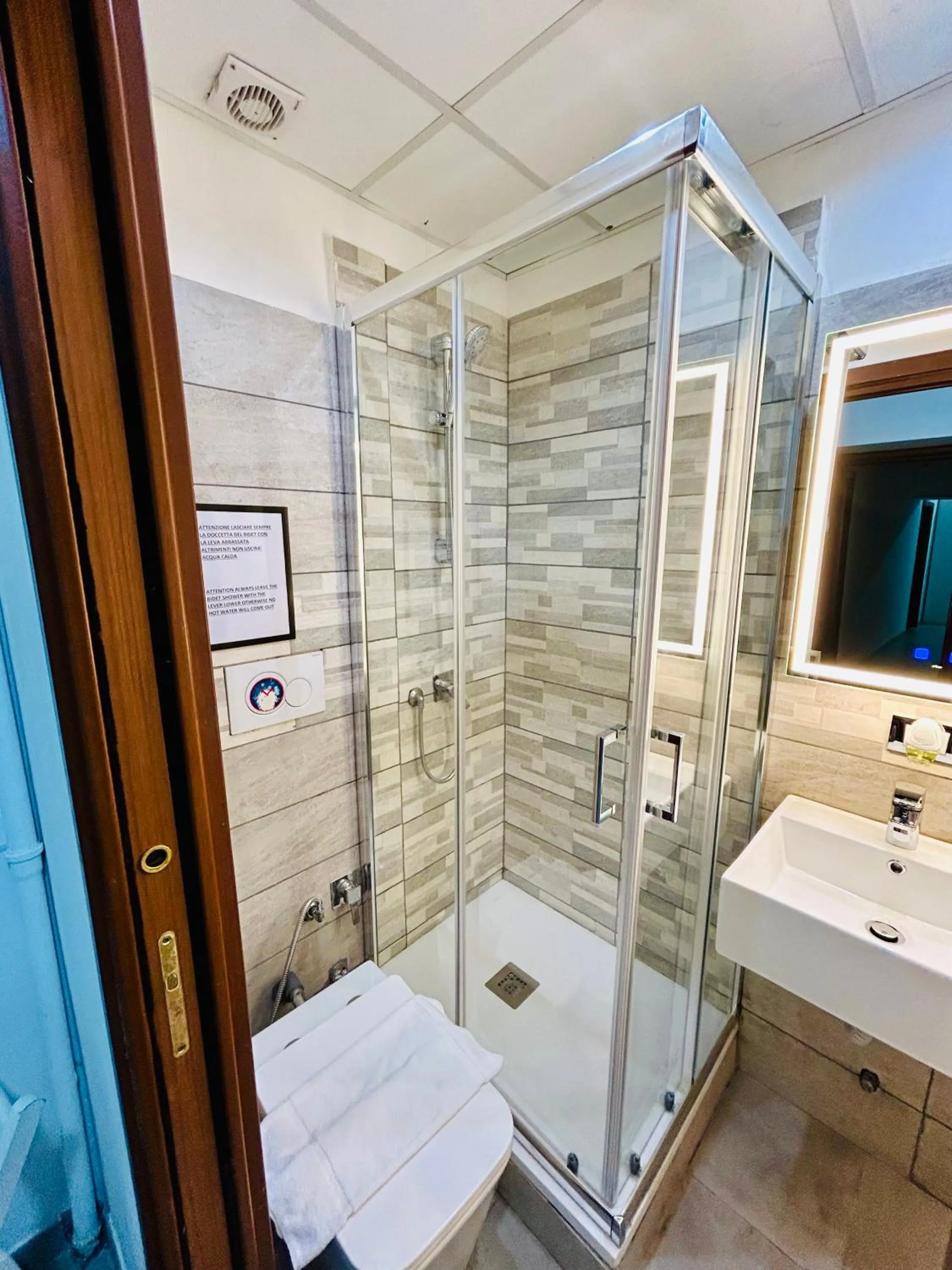 Bathroom in Grandis Rooms