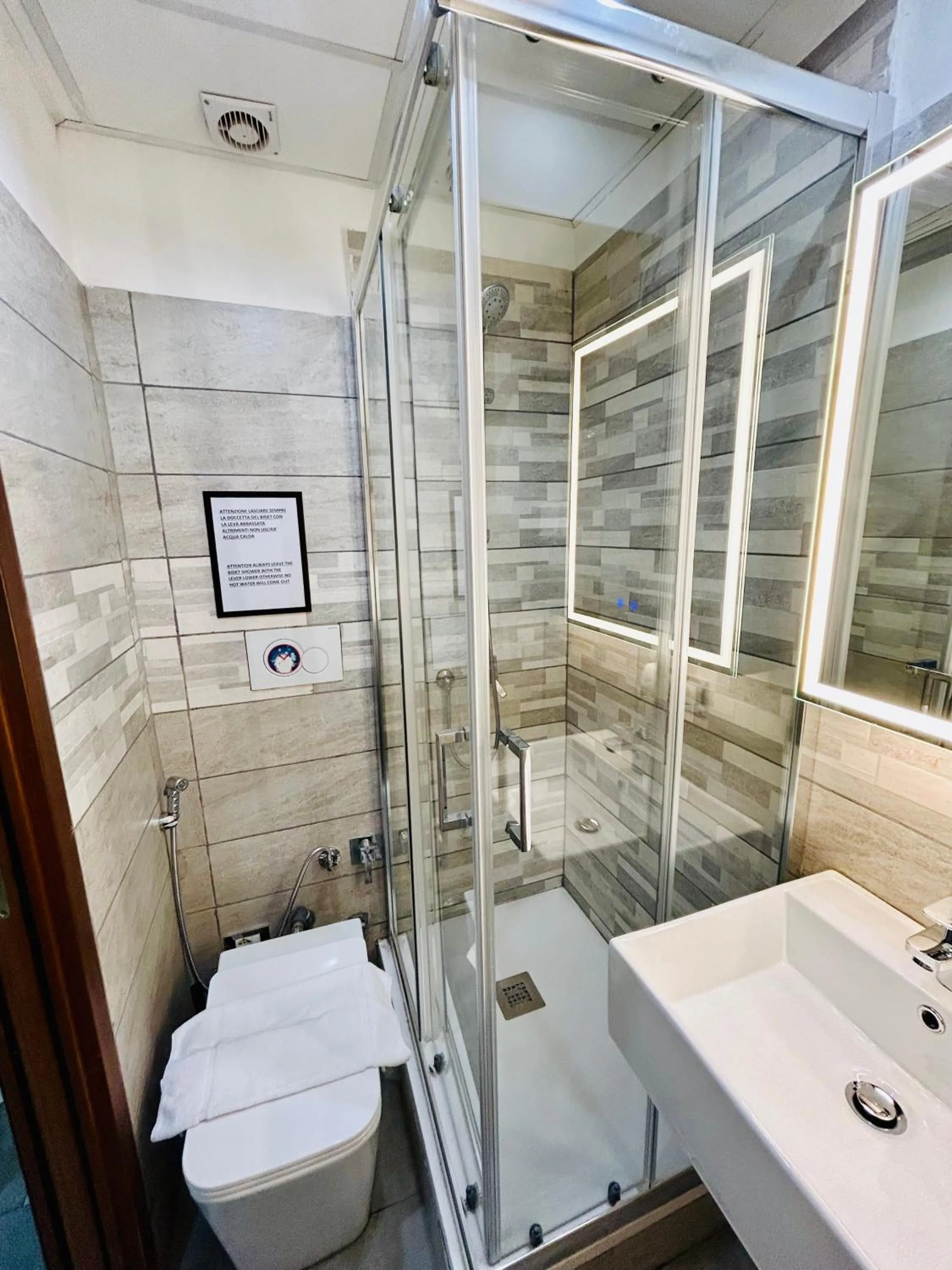 Bathroom in Grandis Rooms