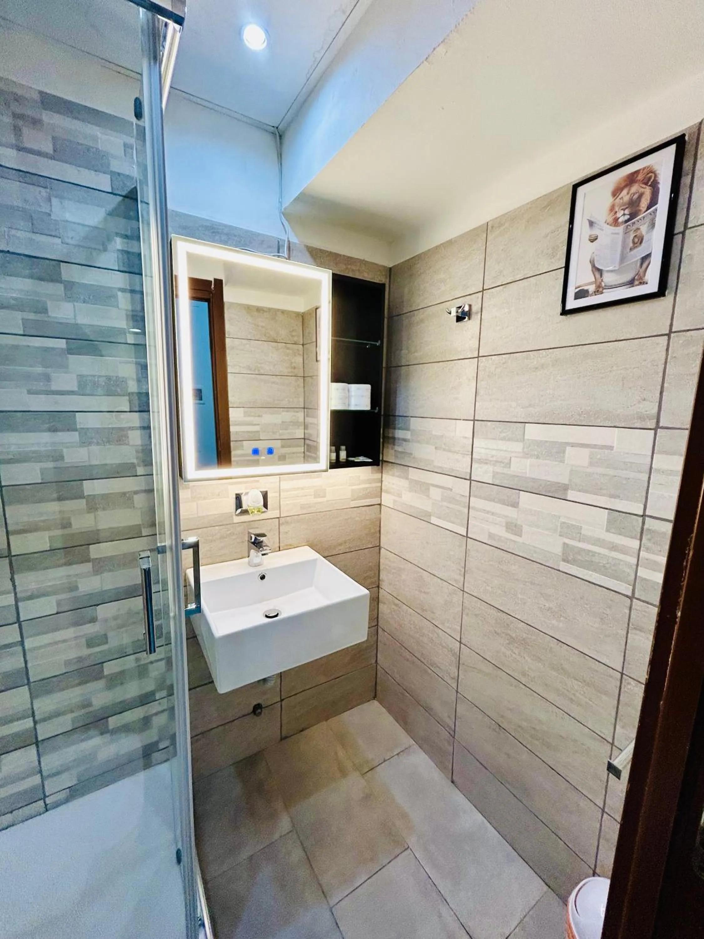 Bathroom in Grandis Rooms