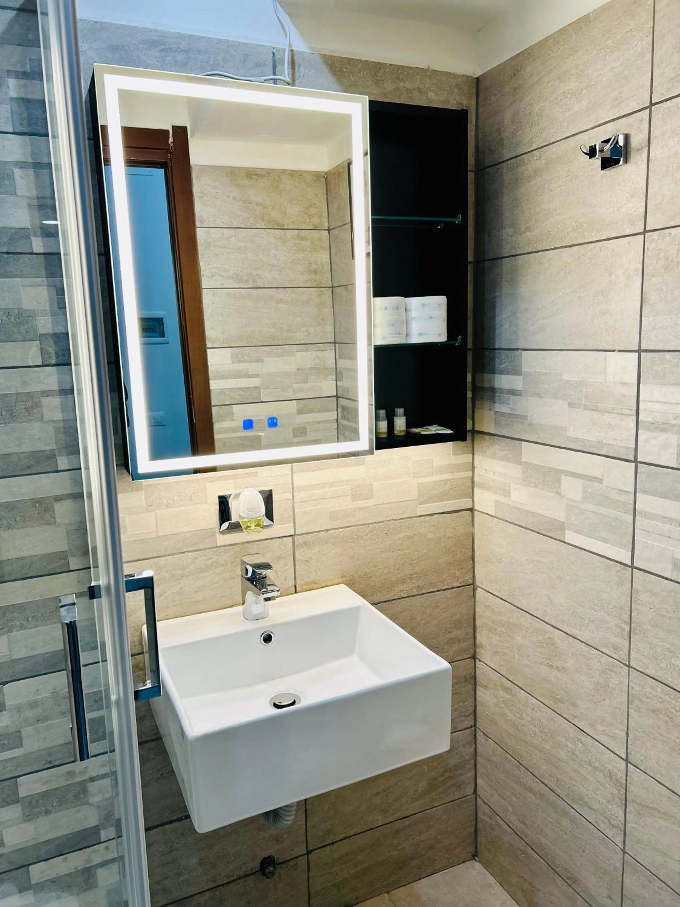 Bathroom in Grandis Rooms