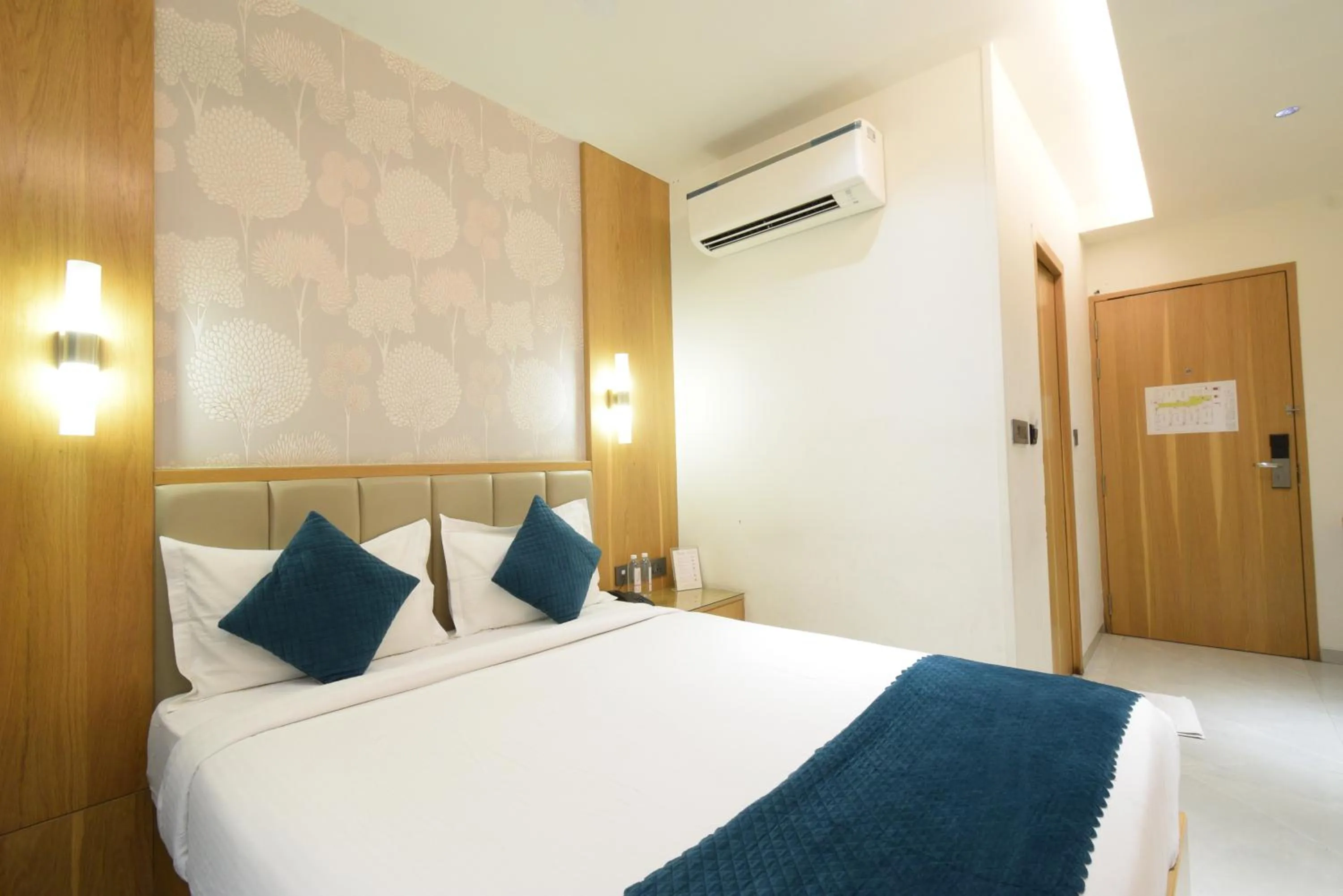 Photo of the whole room, Bed in Hotel TAAR TANGERINE Gachibowli