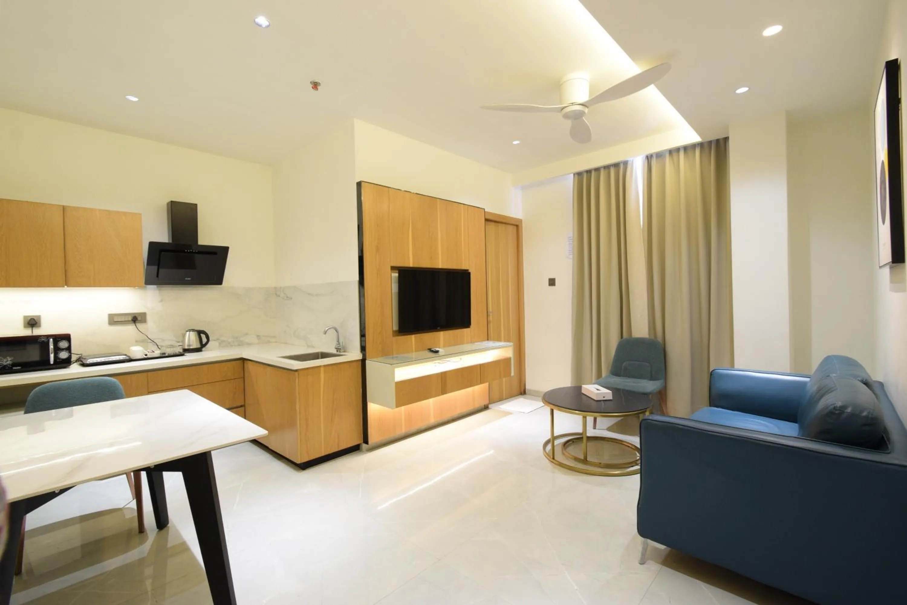 Kitchen or kitchenette in Hotel TAAR TANGERINE Gachibowli