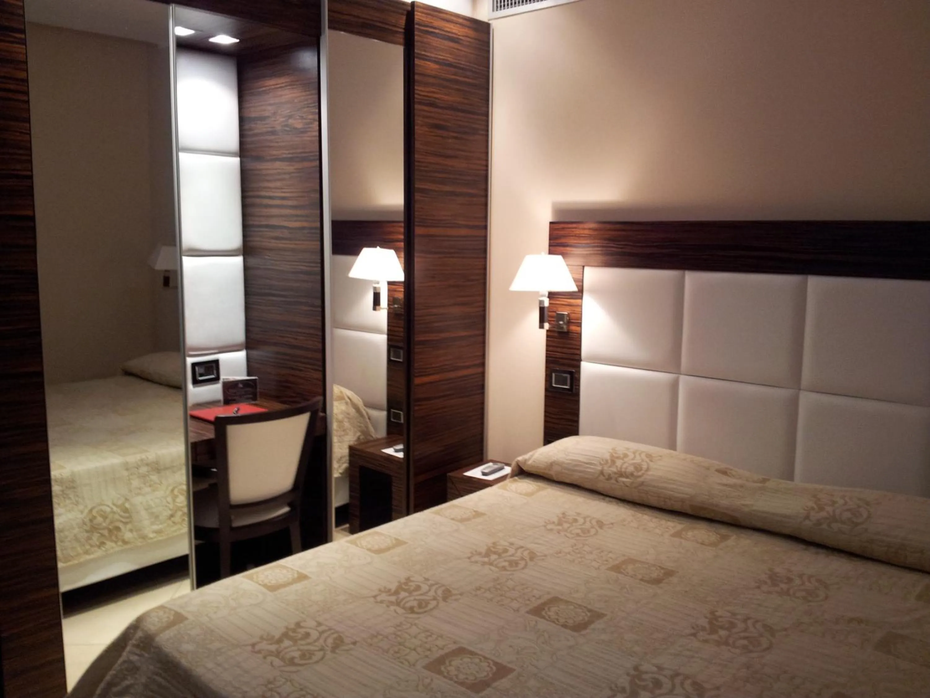 Bed in Hotel Excelsior