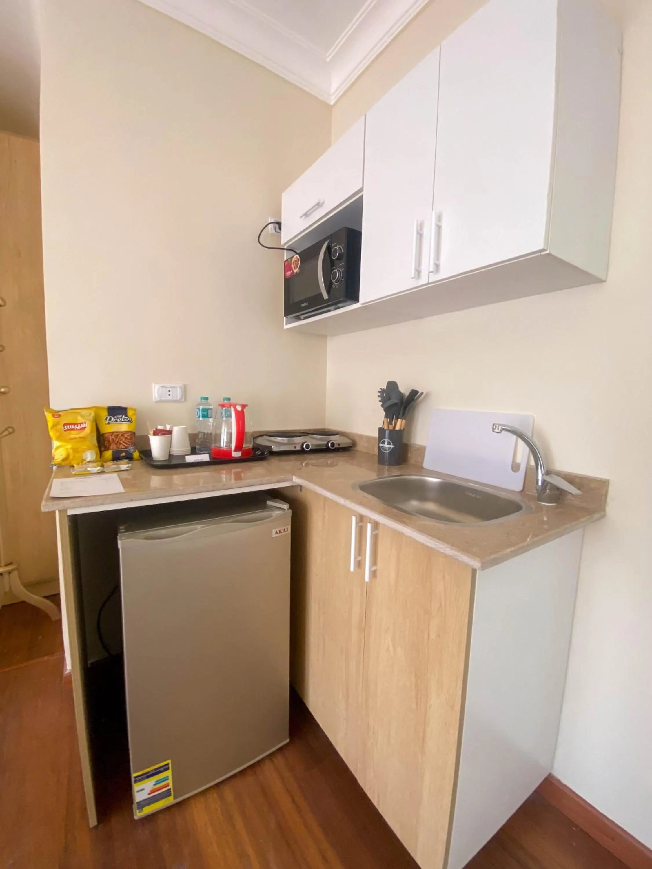 Kitchen or kitchenette in Settle Inn Al Rehab City B