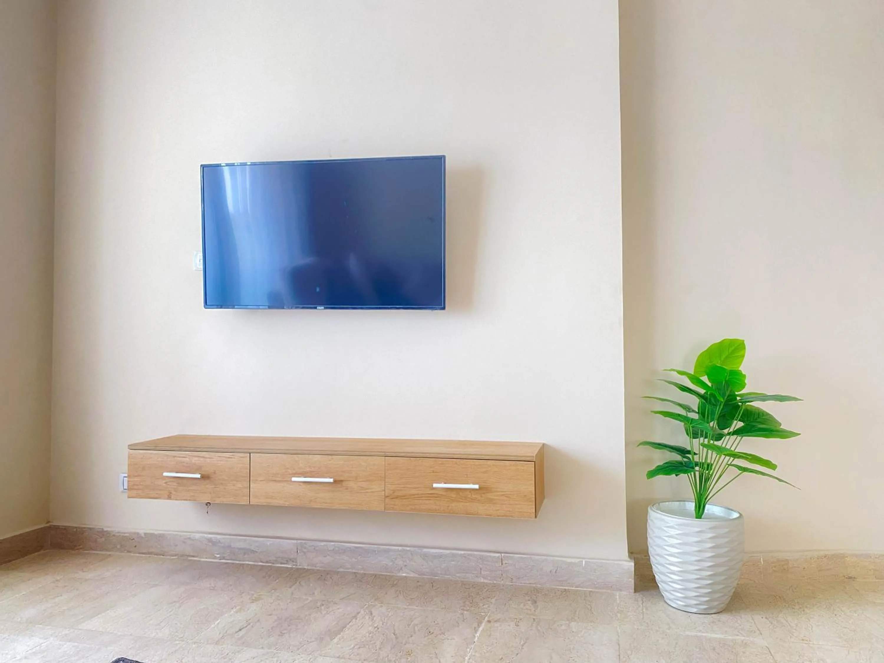 Living room in Settle Inn Al Rehab City B