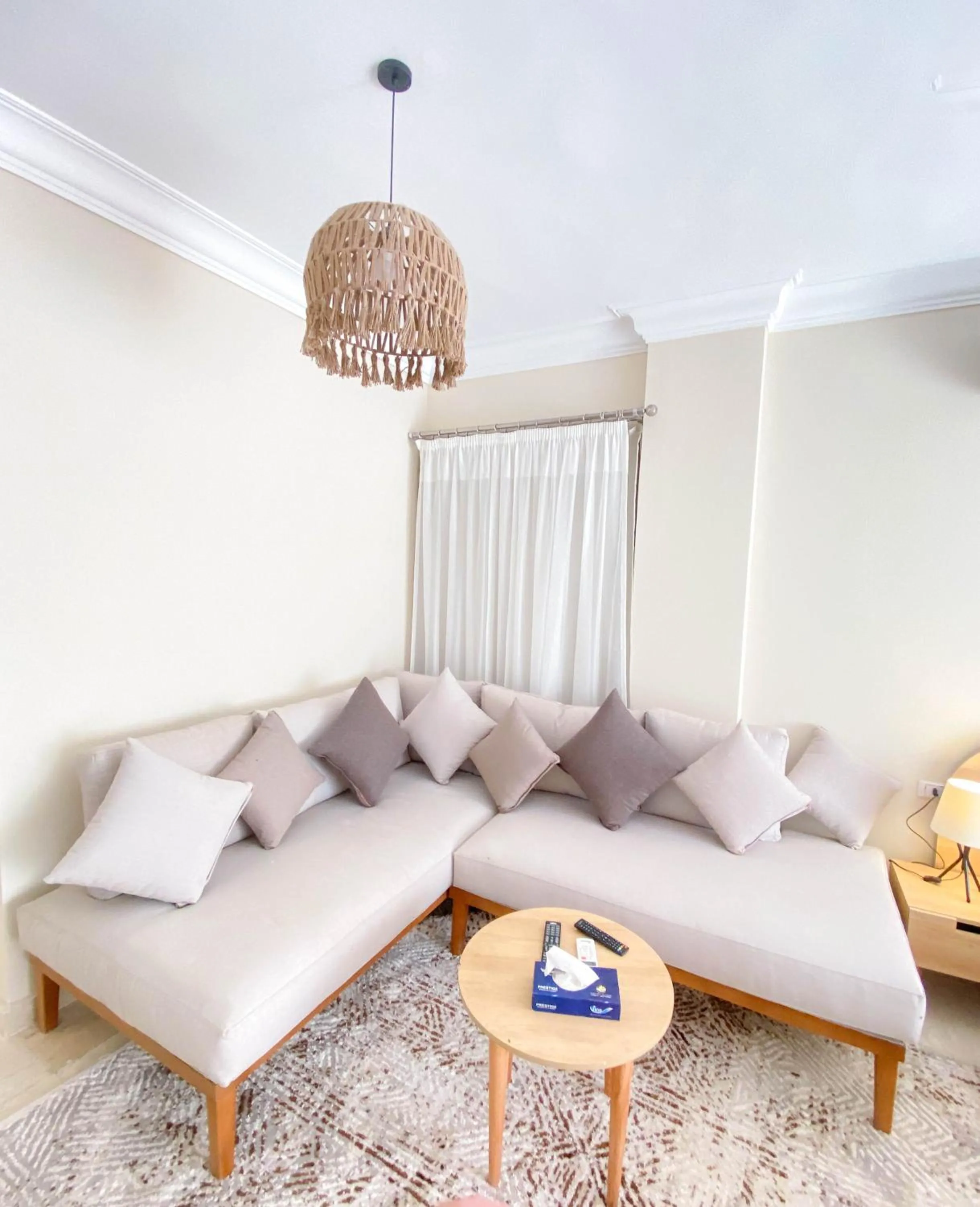 Living room in Settle Inn Al Rehab City B