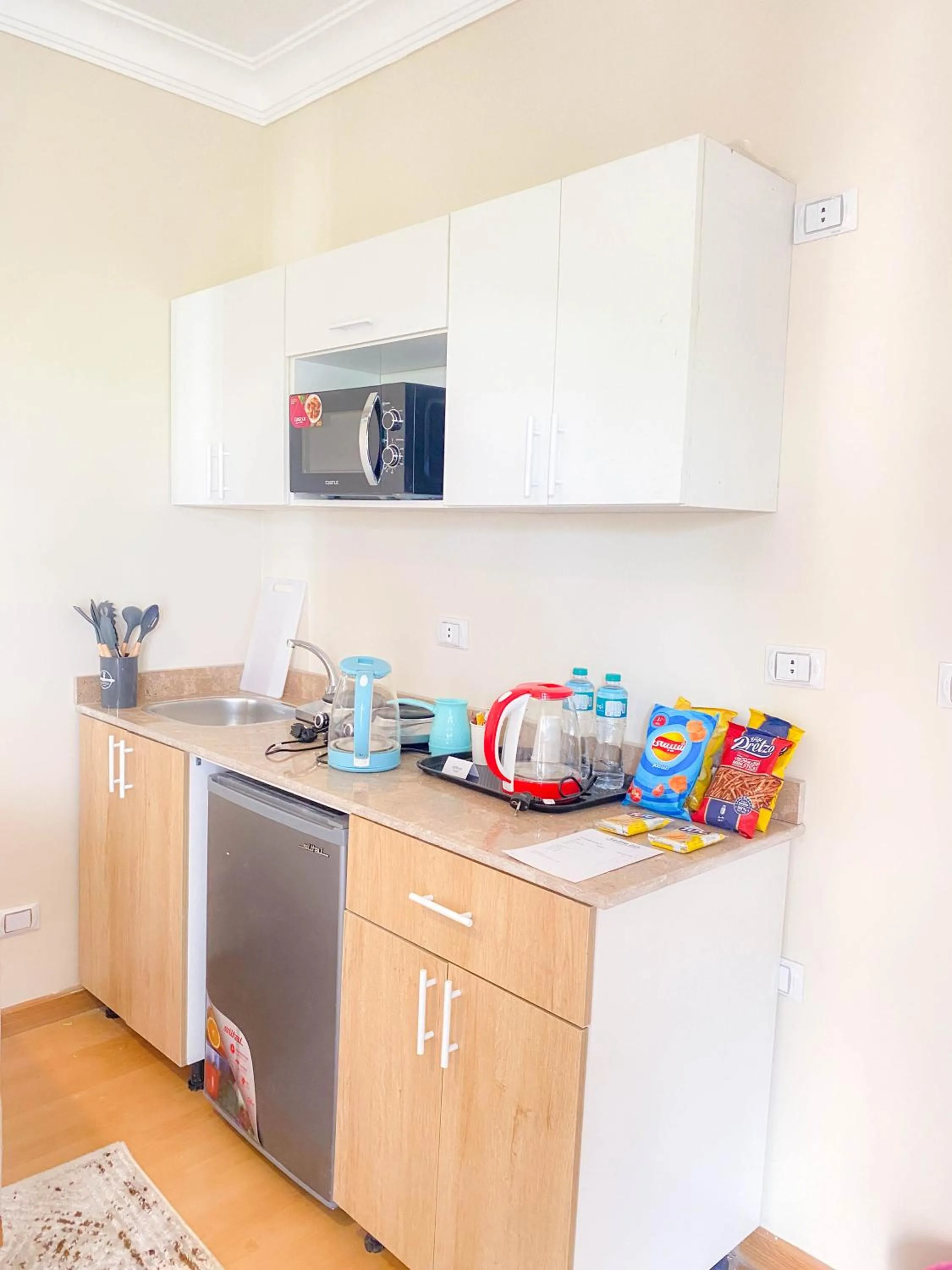 Kitchen or kitchenette in Settle Inn Al Rehab City B