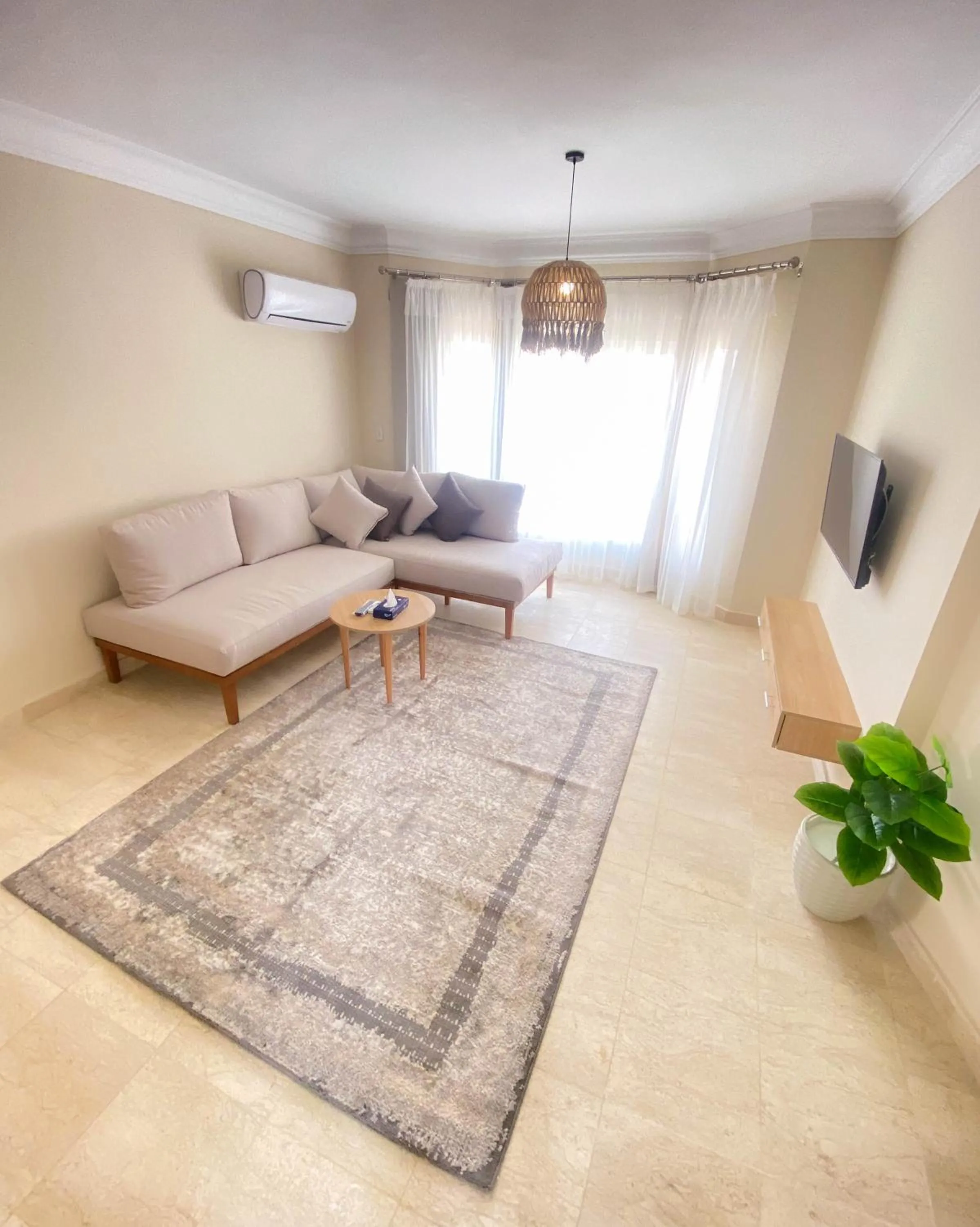 Living room in Settle Inn Al Rehab City B