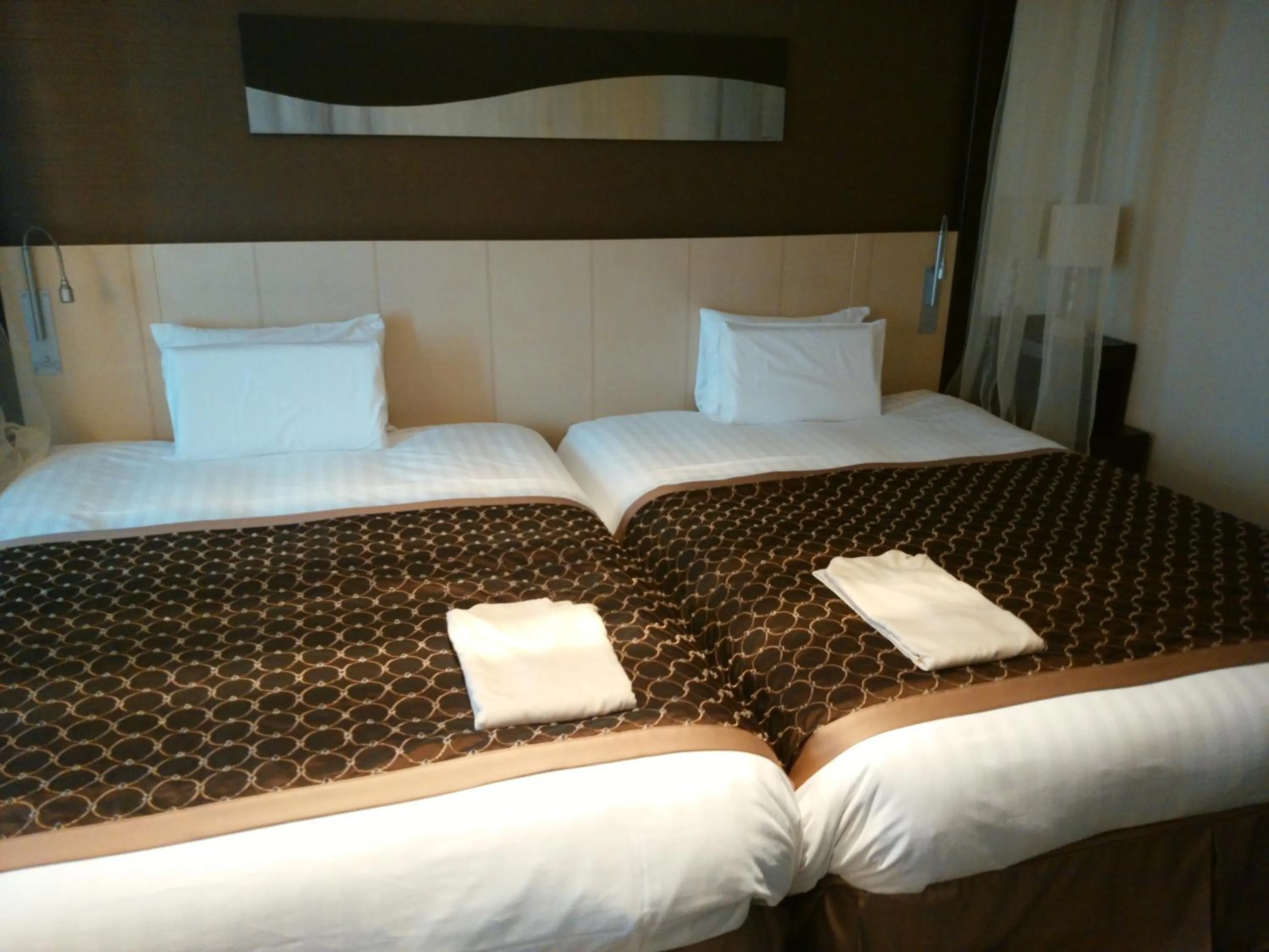 Bed in JR Hotel Clement Tokushima