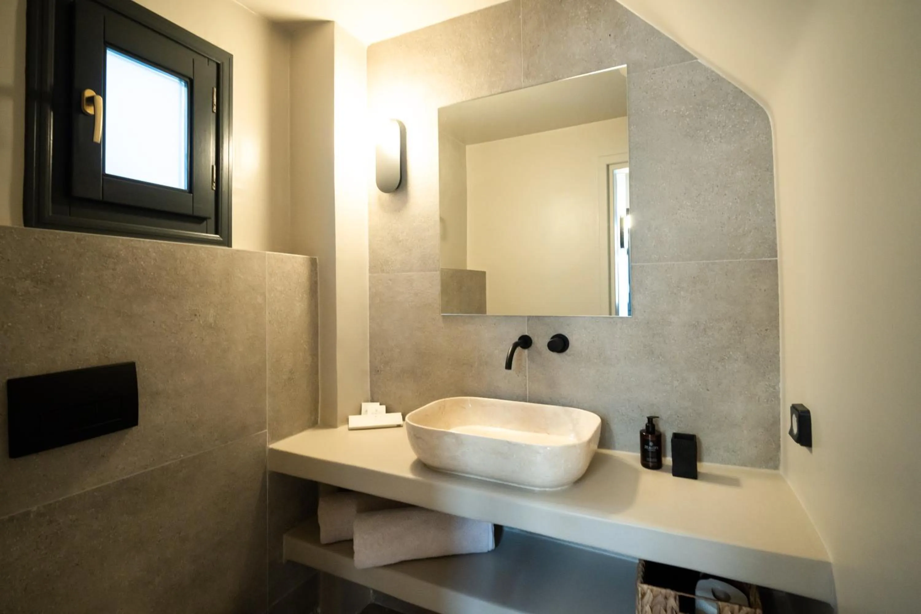 Toilet in Black Diamond Suites