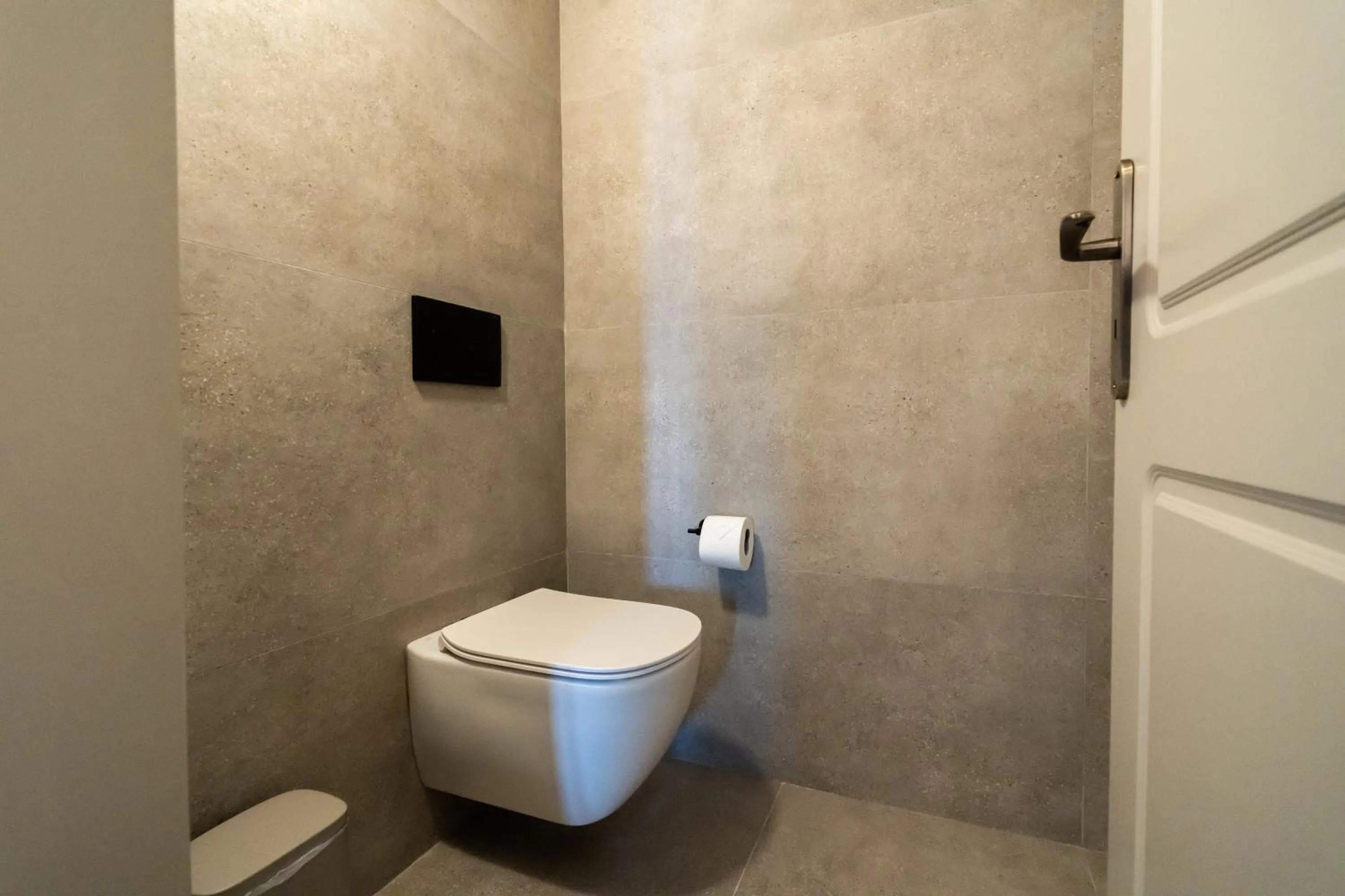 Toilet in Black Diamond Suites