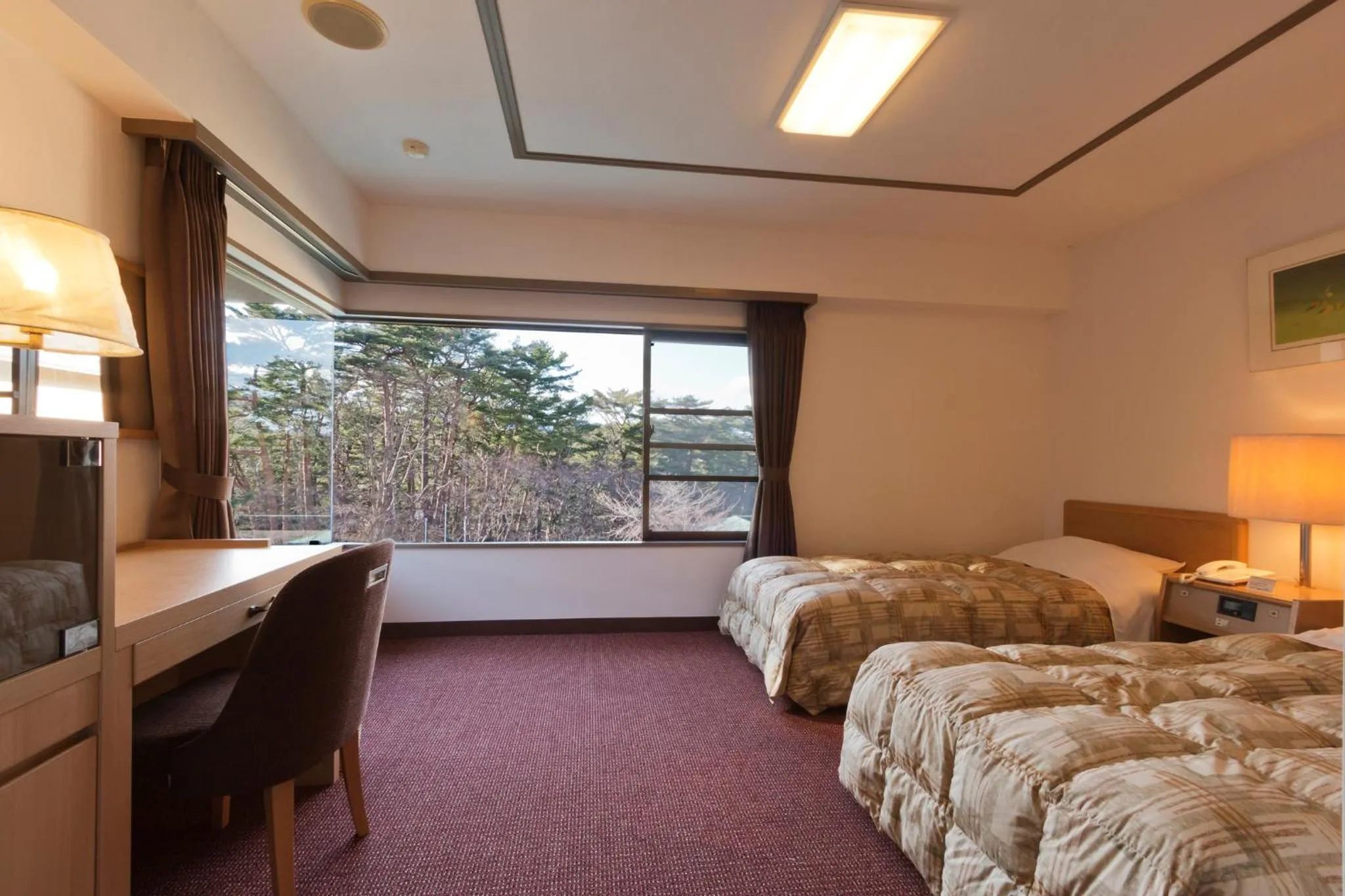 Bed in Jodogahama Park Hotel