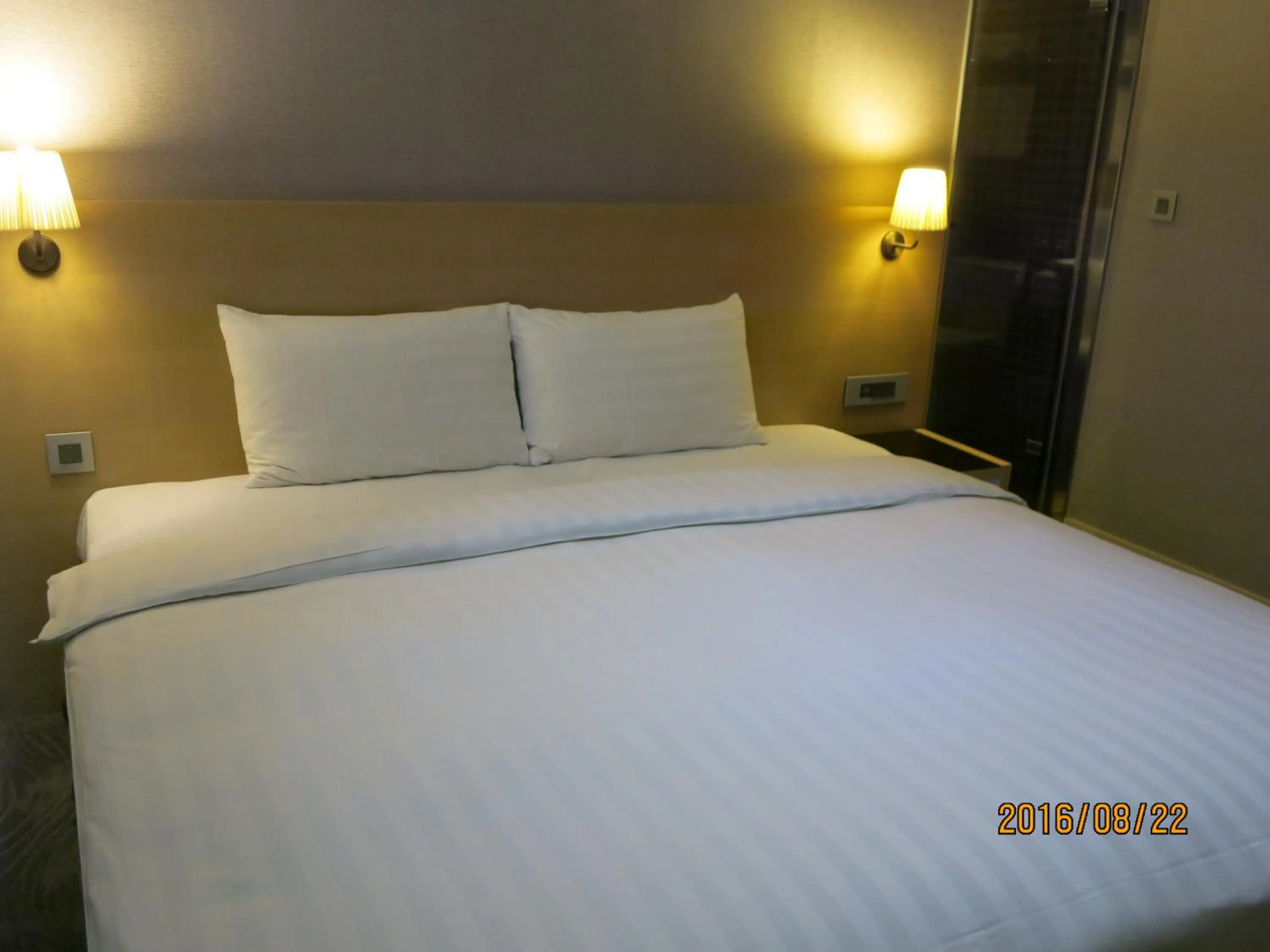 Bed in Lessing Hotel Qixian