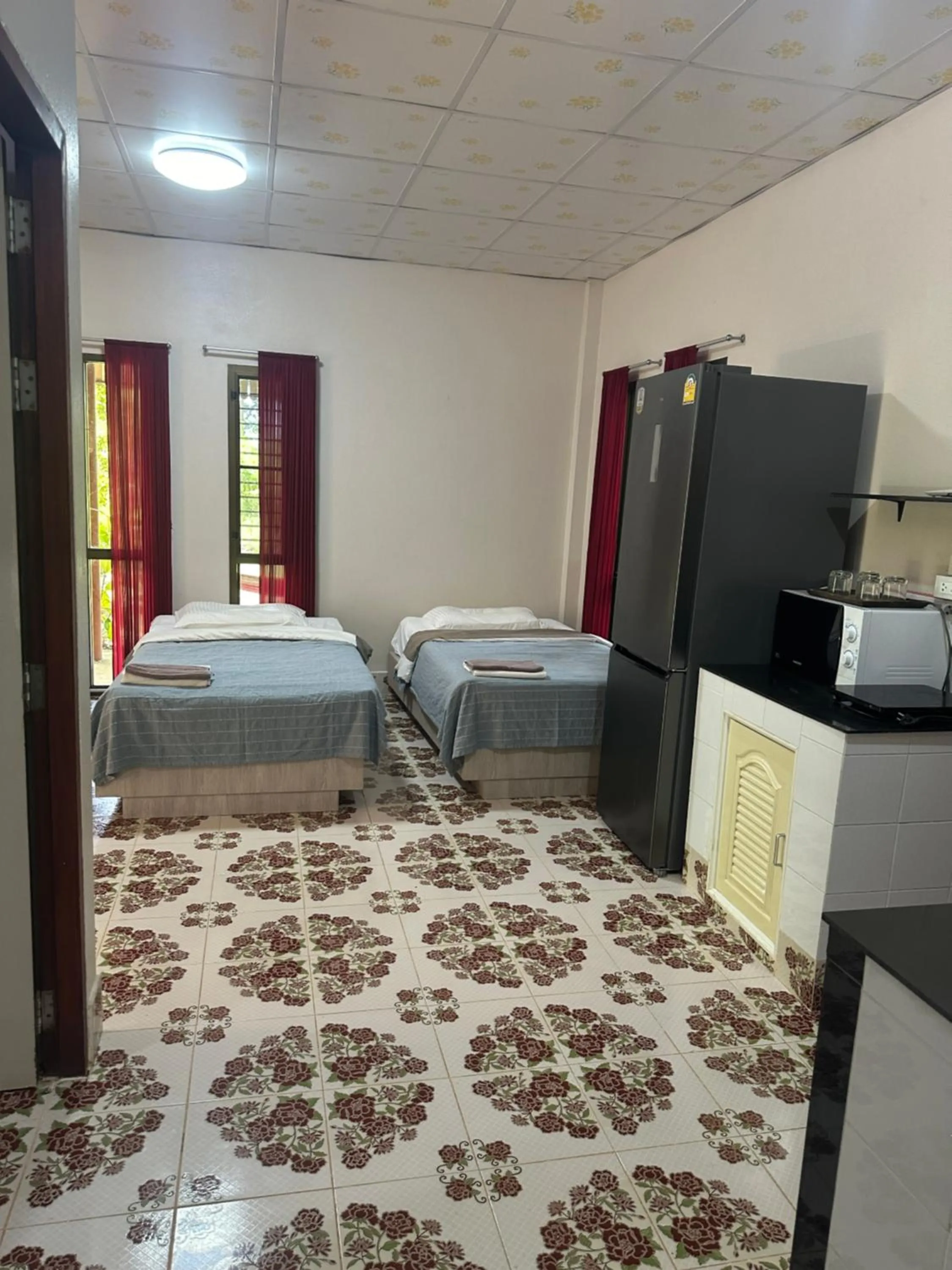 Living room, Bed in Fine Times Resort