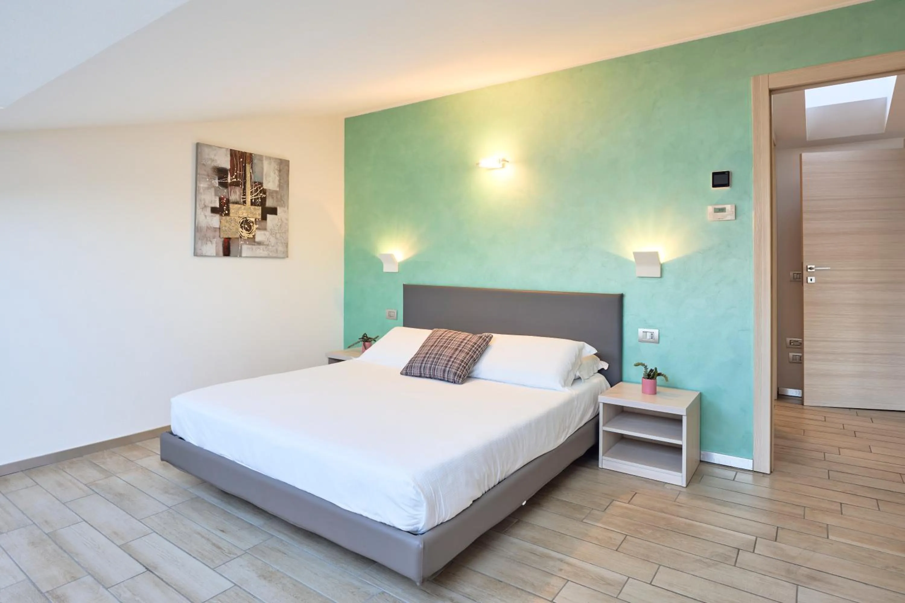 Bedroom, Bed in Bellagio Village - Holiday Apartments by the Lake - Seasonal Warm Pool and Sauna