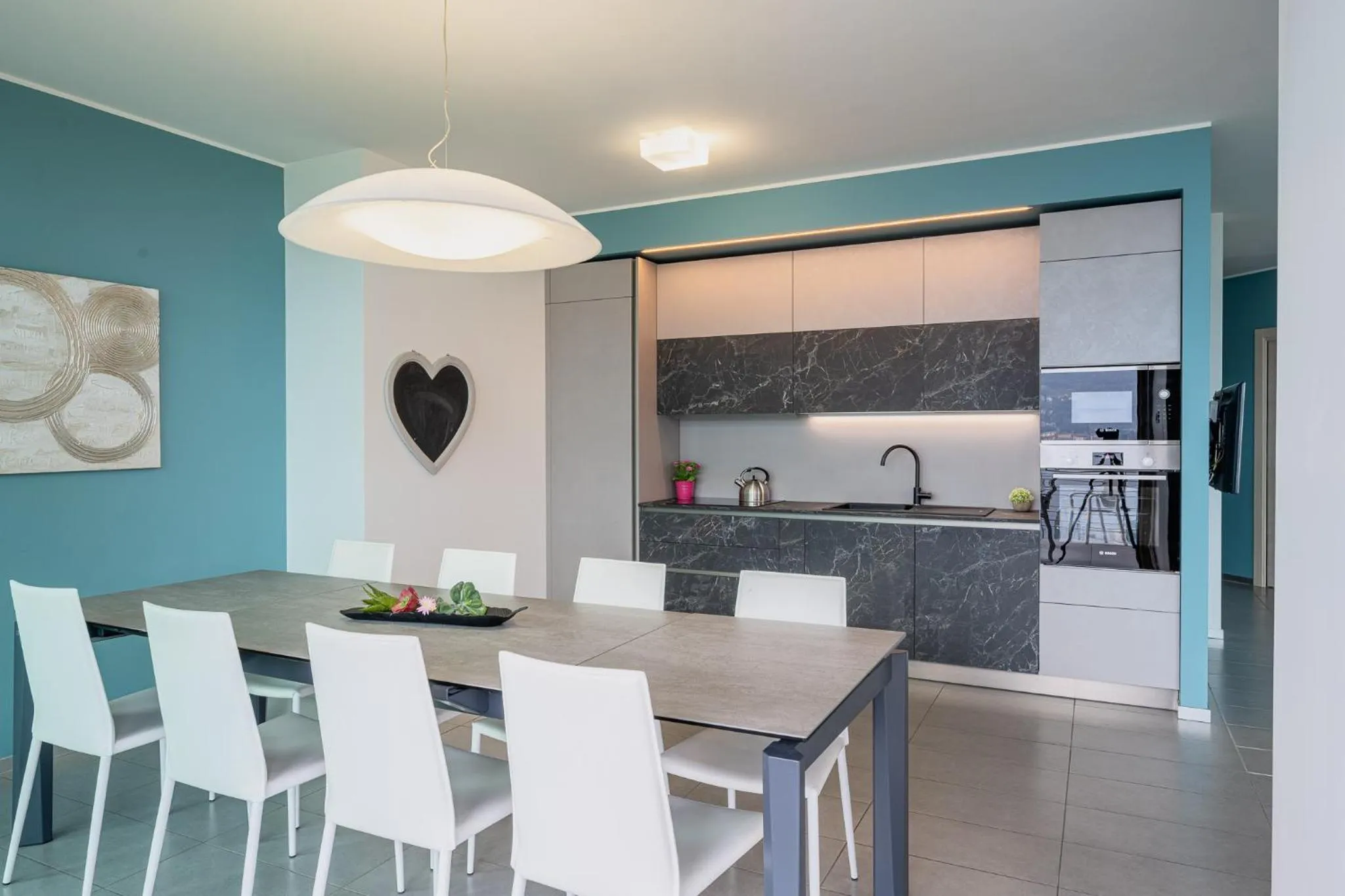 Kitchen or kitchenette in Bellagio Village - Holiday Apartments by the Lake - Seasonal Warm Pool and Sauna