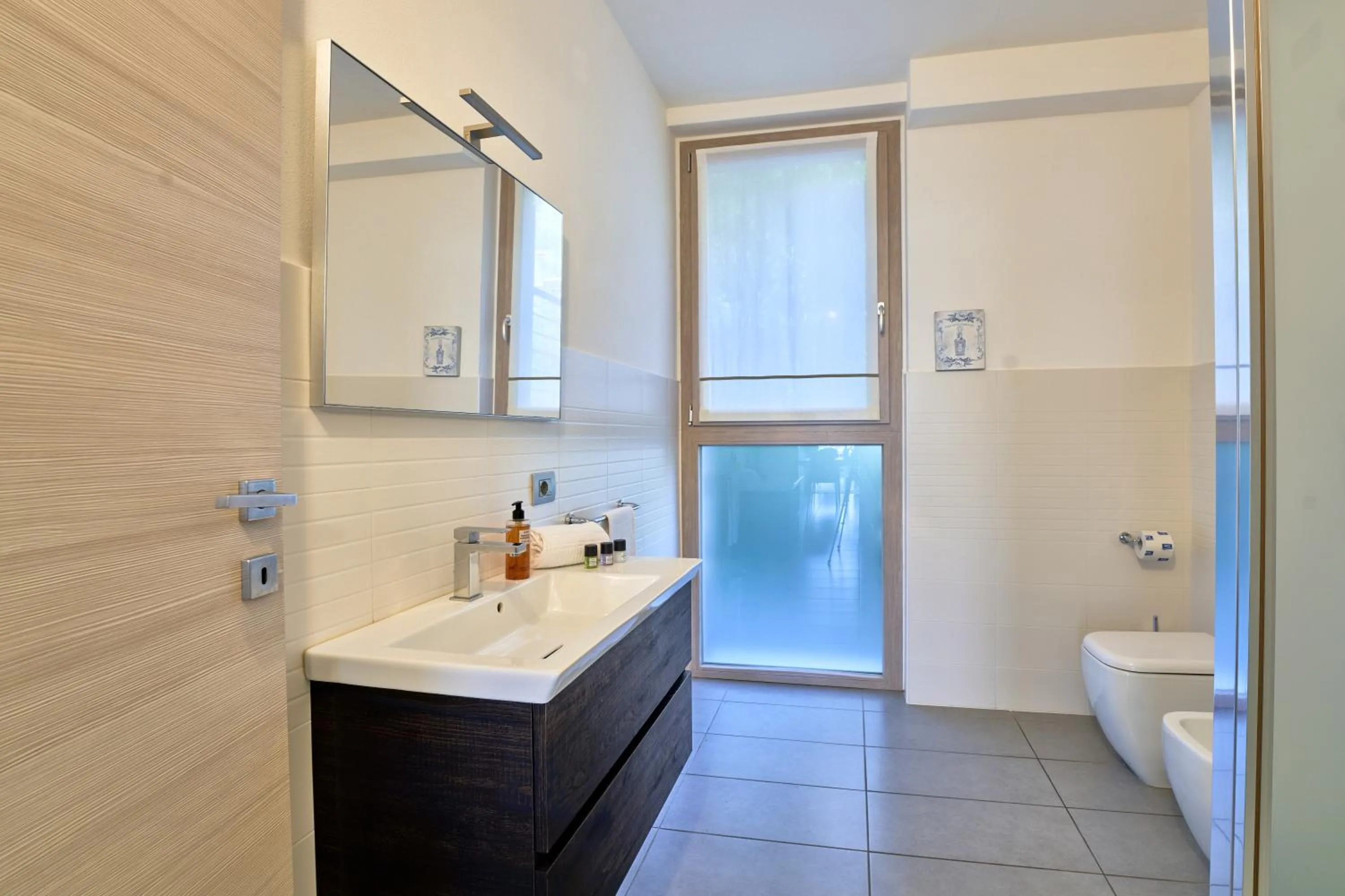 Bathroom in Bellagio Village - Holiday Apartments by the Lake - Seasonal Warm Pool and Sauna