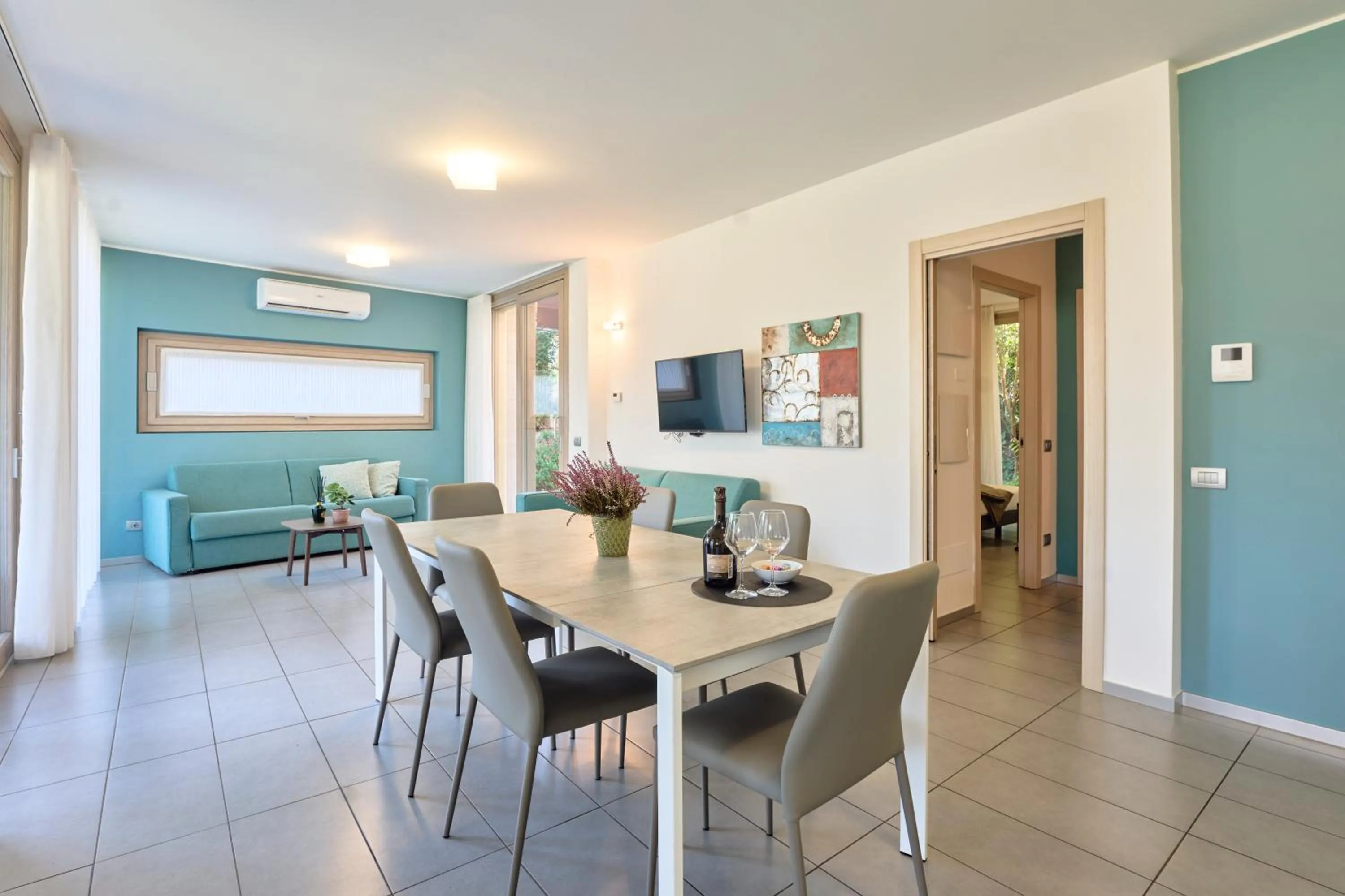 Living room in Bellagio Village - Holiday Apartments by the Lake - Seasonal Warm Pool and Sauna