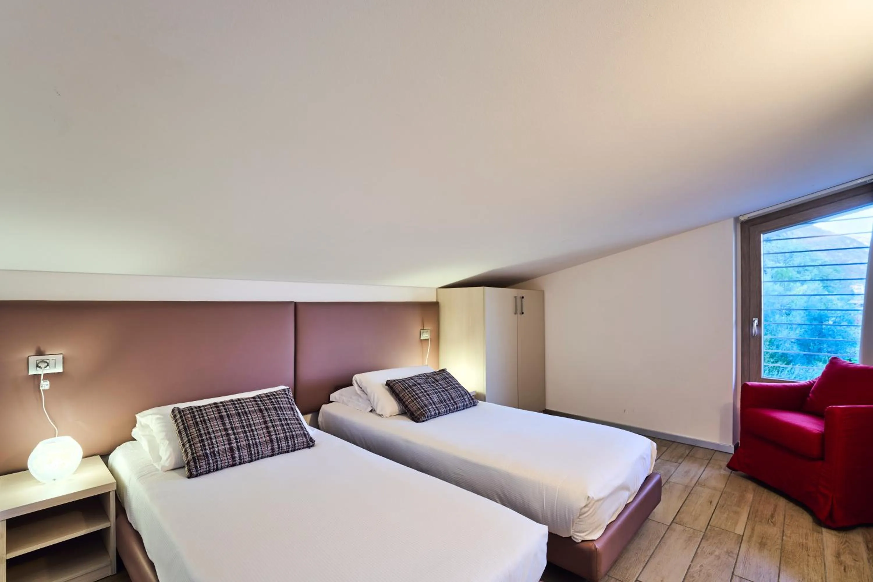 Bedroom, Bed in Bellagio Village - Holiday Apartments by the Lake - Seasonal Warm Pool and Sauna