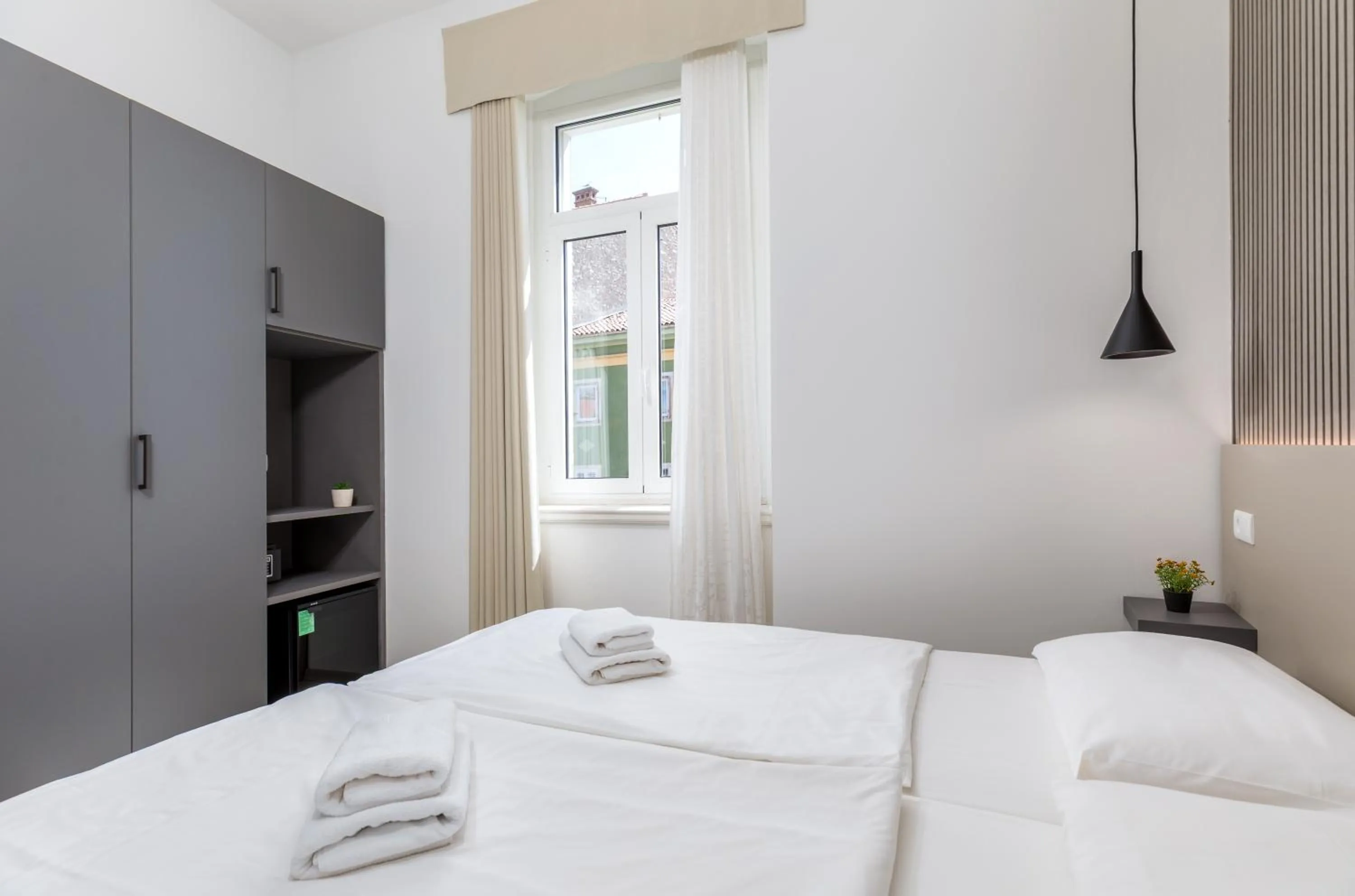 Bed in Boutique Suites Joyce