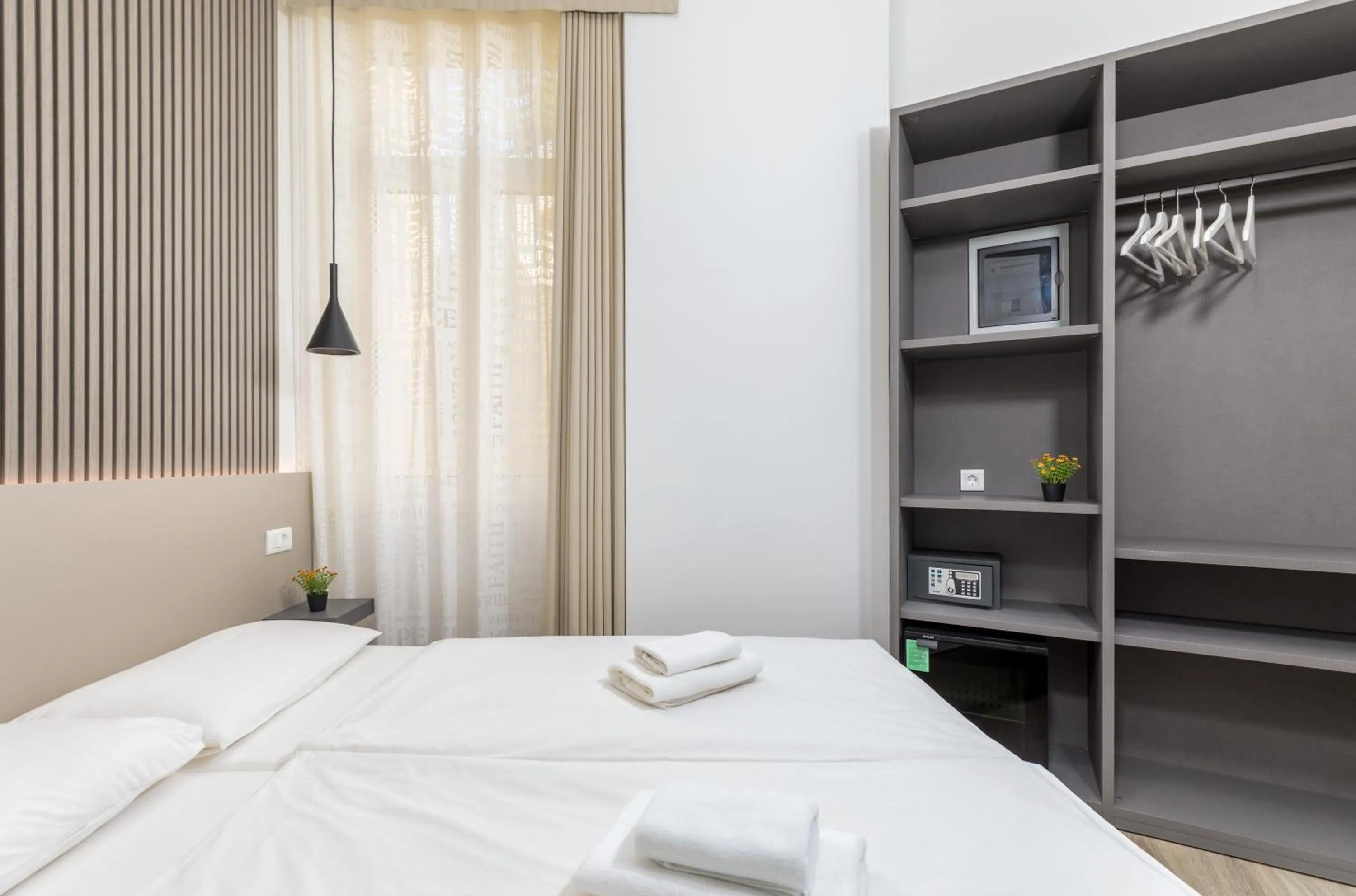 Photo of the whole room, Bed in Boutique Suites Joyce