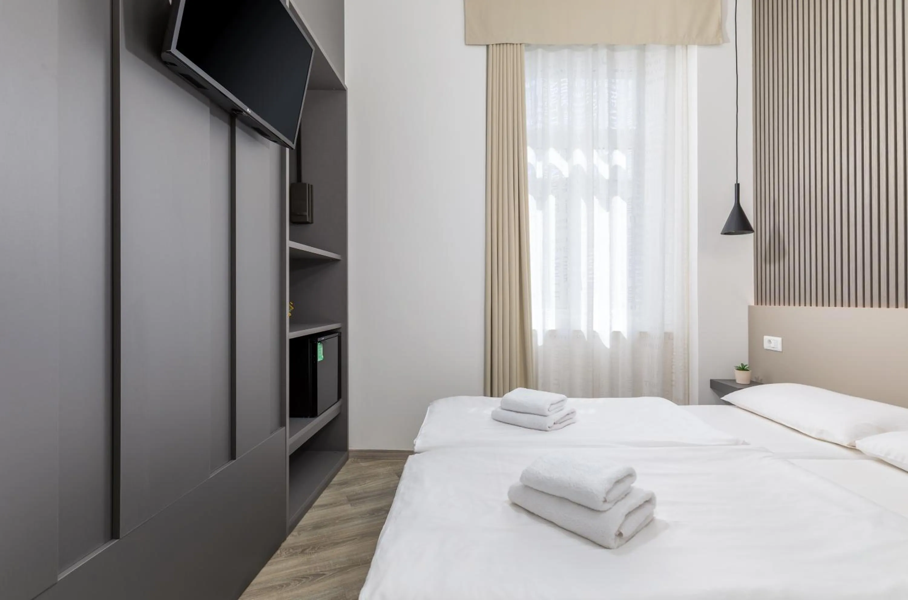 Photo of the whole room, Bed in Boutique Suites Joyce