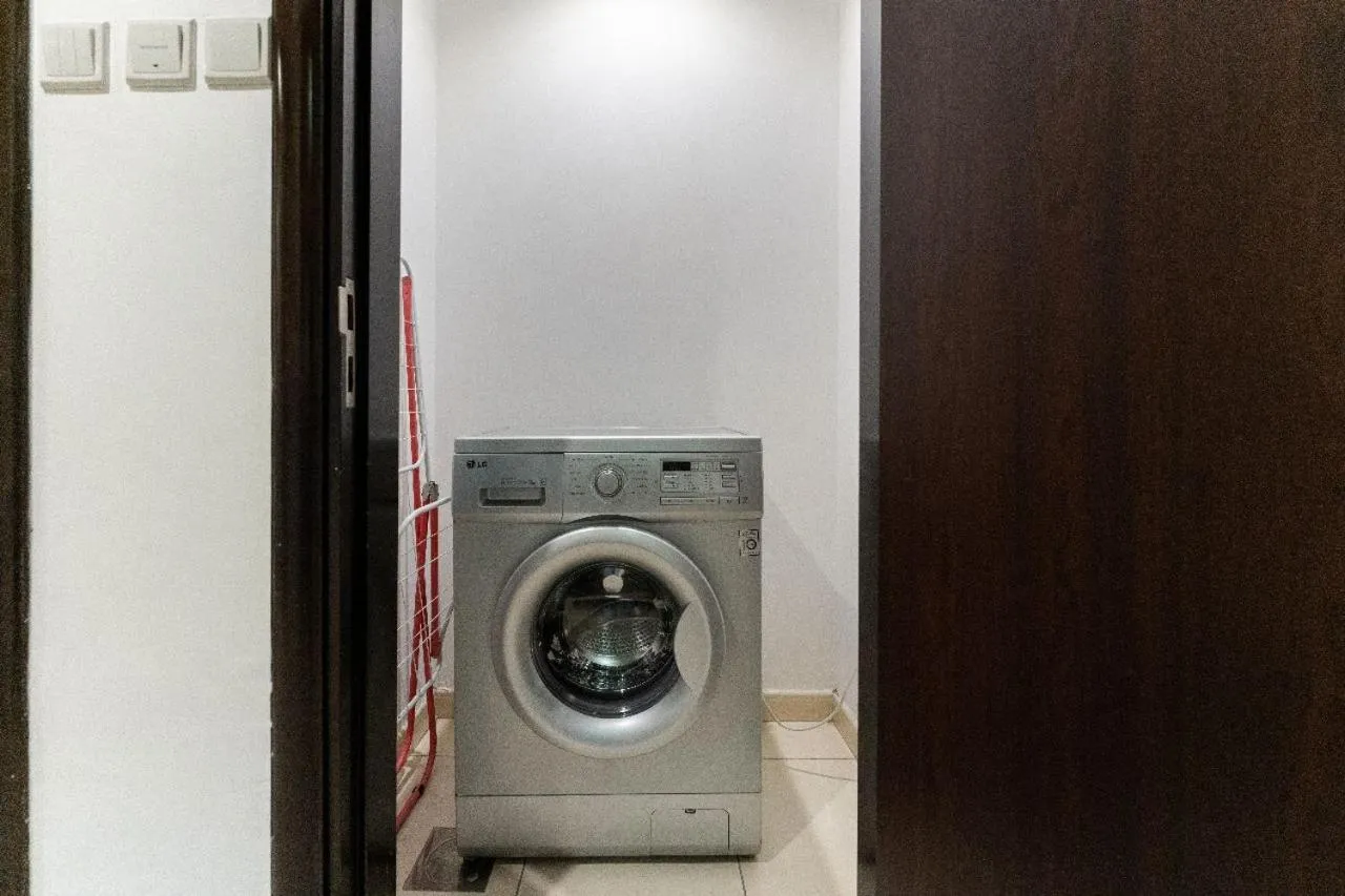 washing machine in City Stay Prime Hotel Apartments - Al Barsha