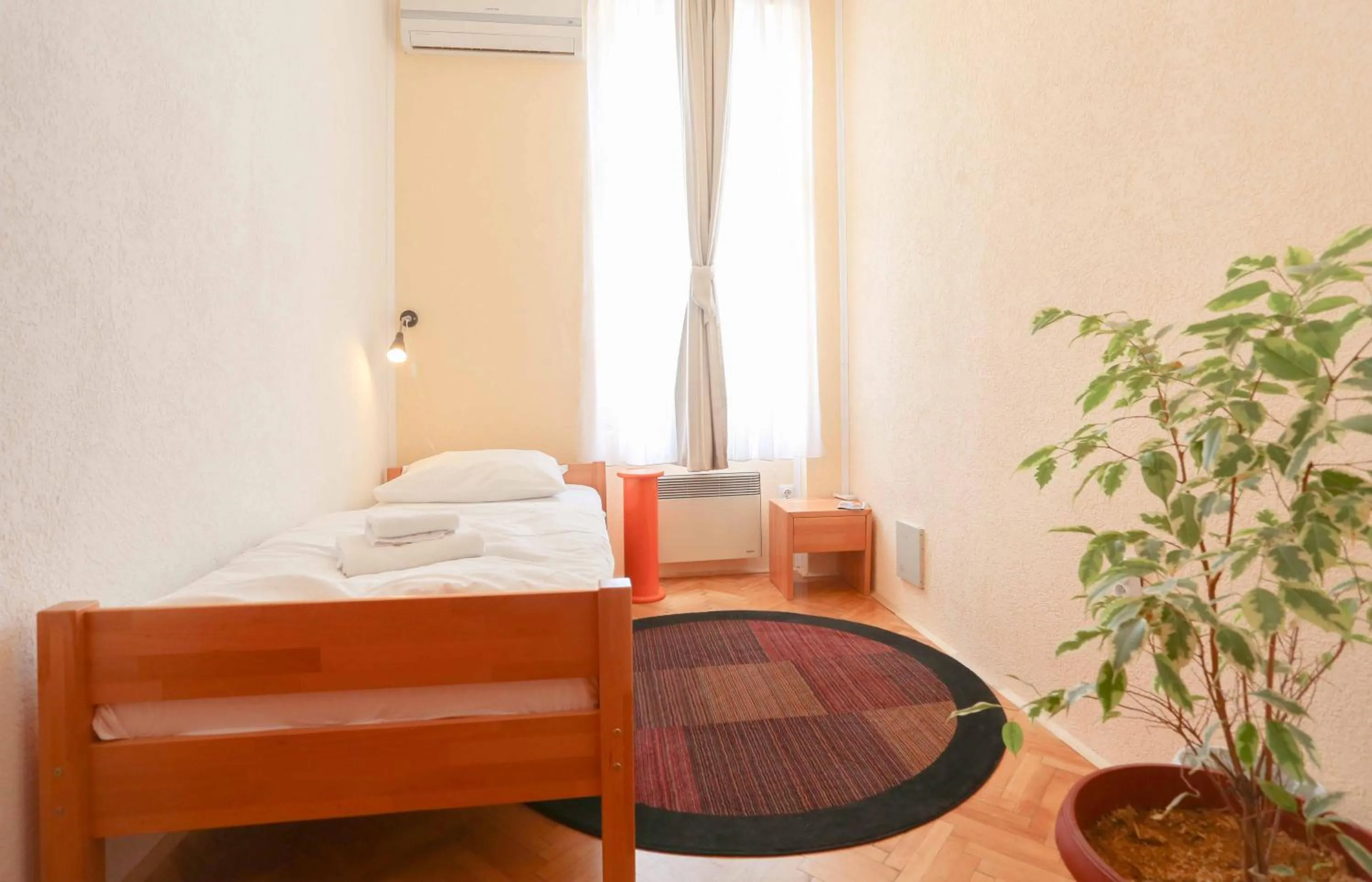 Bed in Pigeon Square Rooms