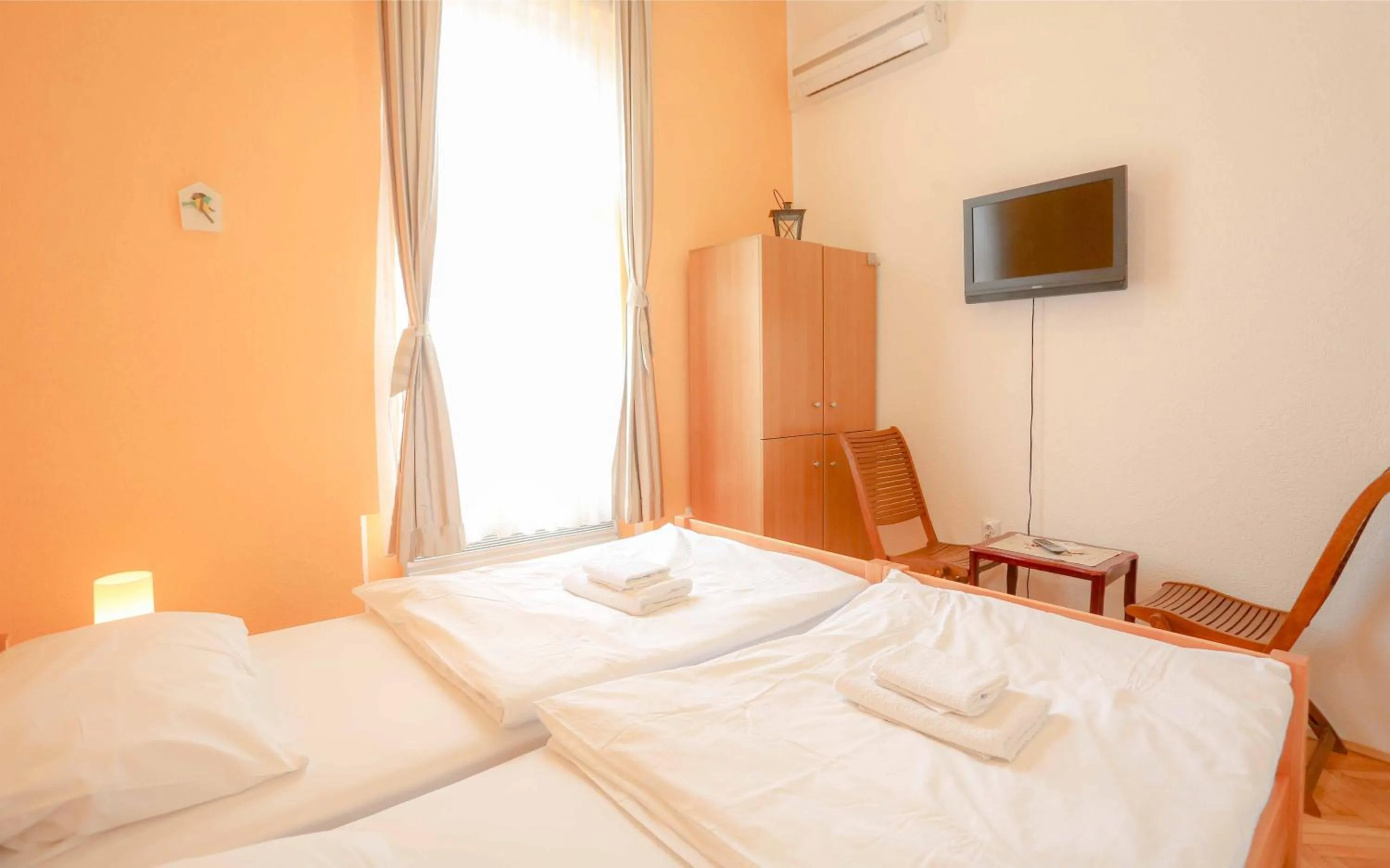 Bed in Pigeon Square Rooms