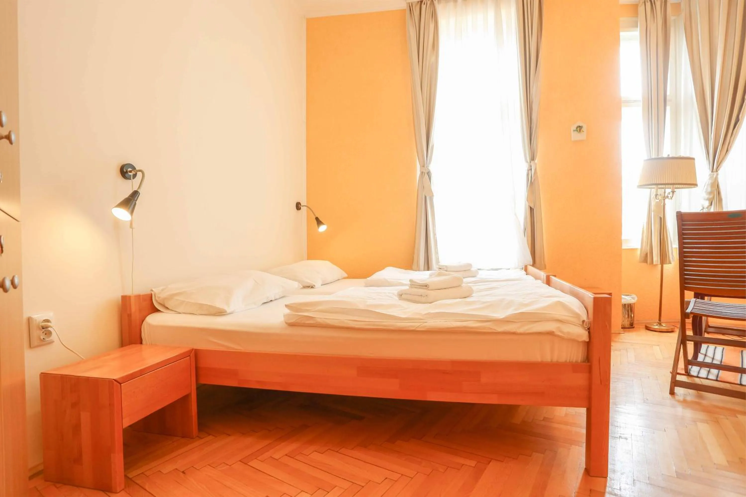 Bed in Pigeon Square Rooms