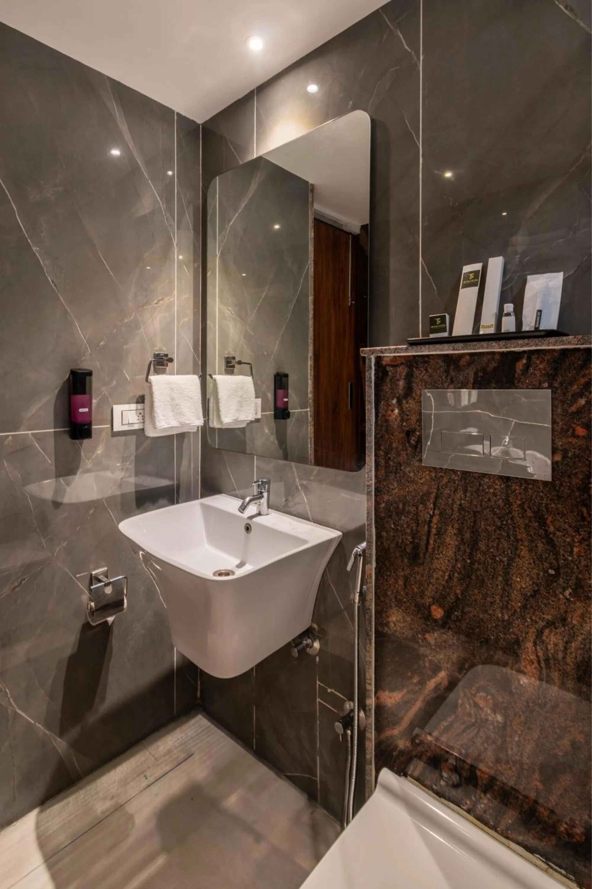 Bathroom in Triton Suites By Bestinn Leisure