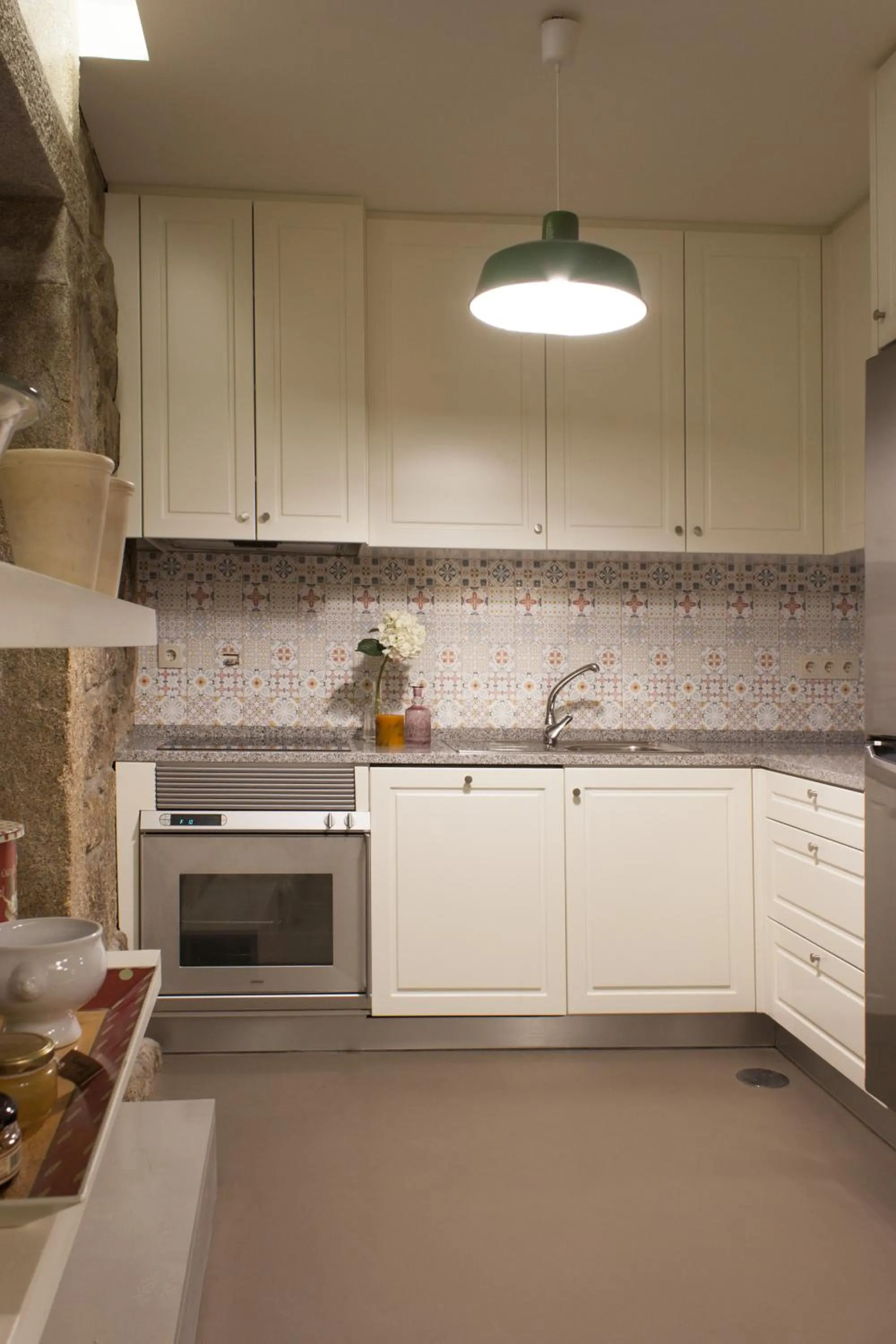 Communal kitchen in Being Porto Hostel