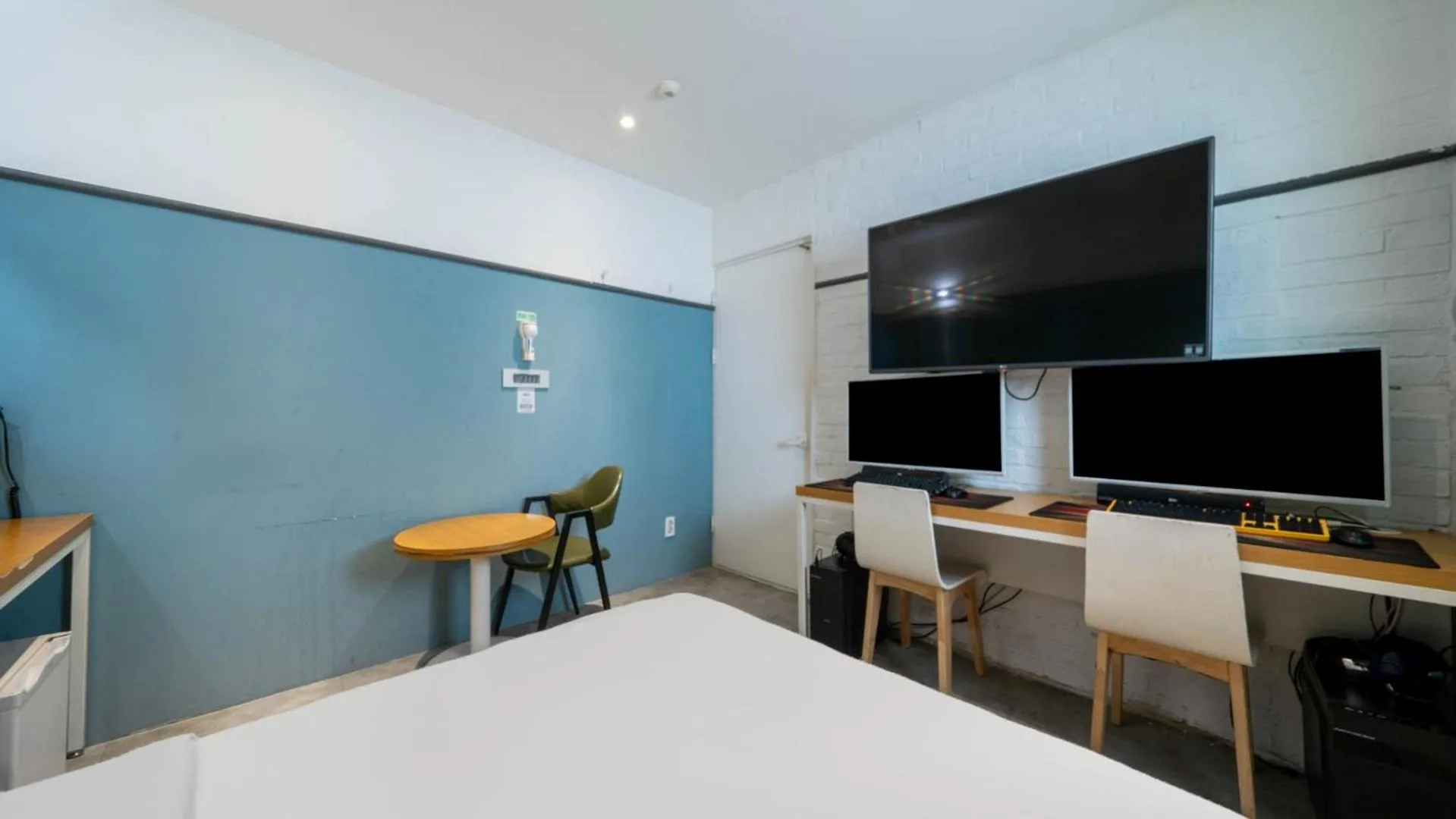 Photo of the whole room, Bed in NU Hotel