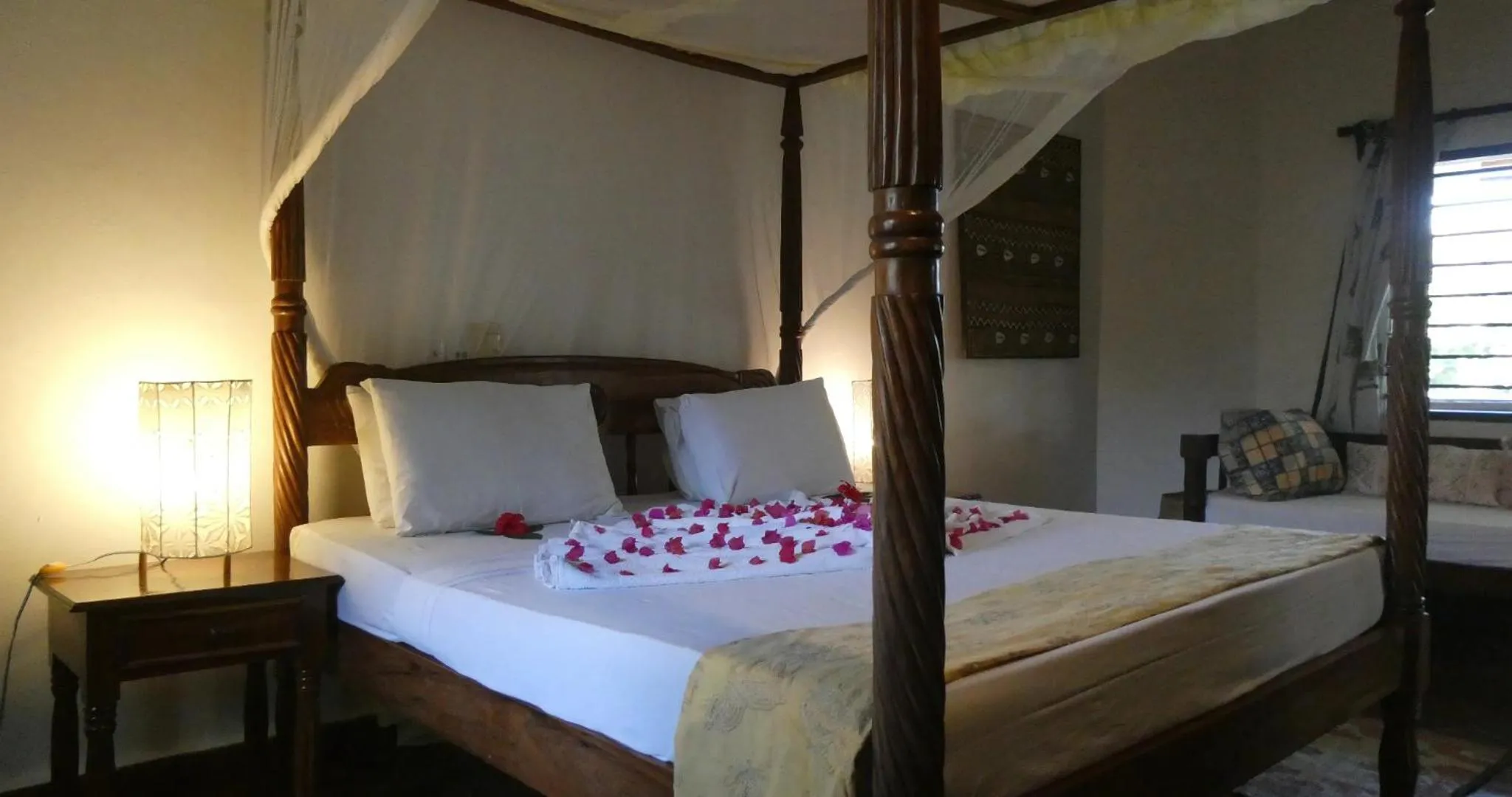 Bed in Lily Palm Resort