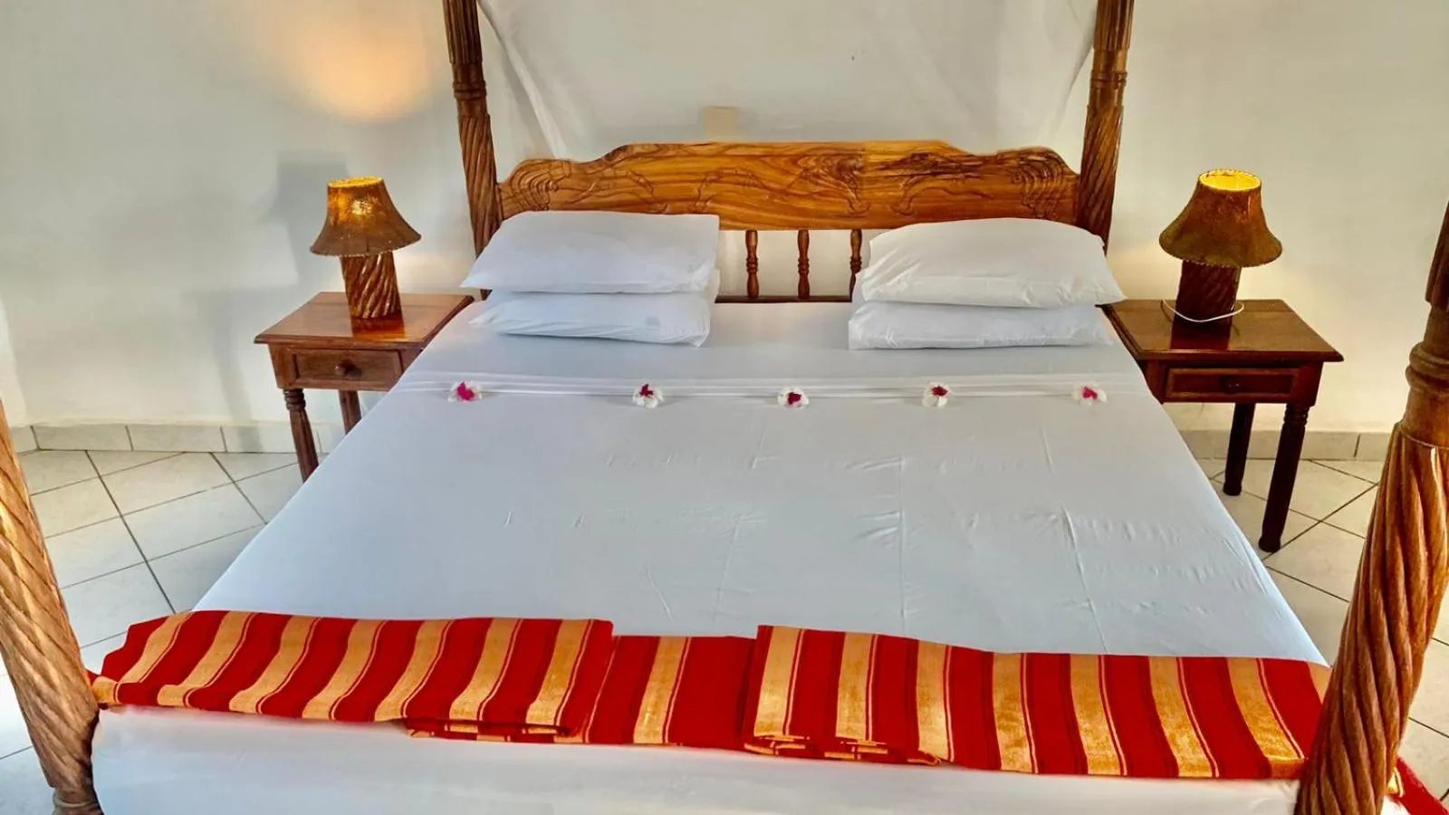 Bed in Lily Palm Resort