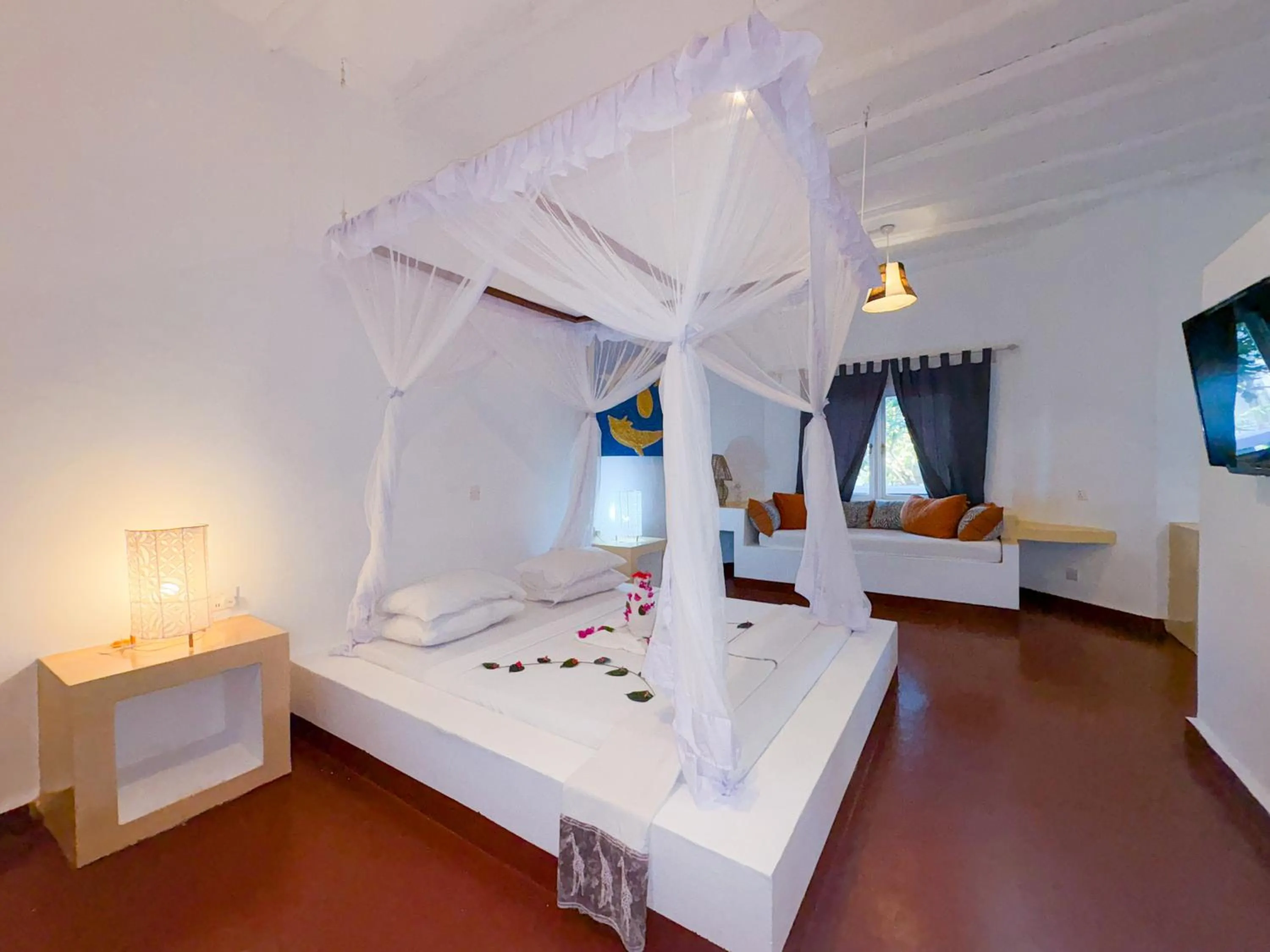 Bed in Lily Palm Resort