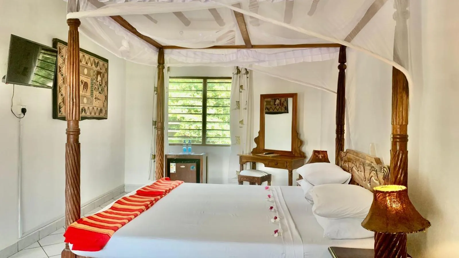 Bed in Lily Palm Resort