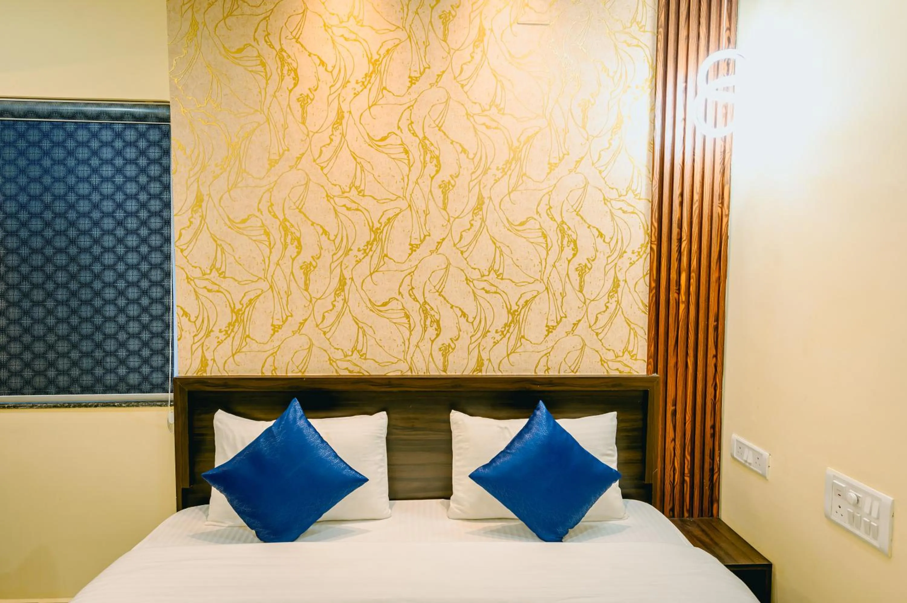 Bed in Livotel Premium Hotel