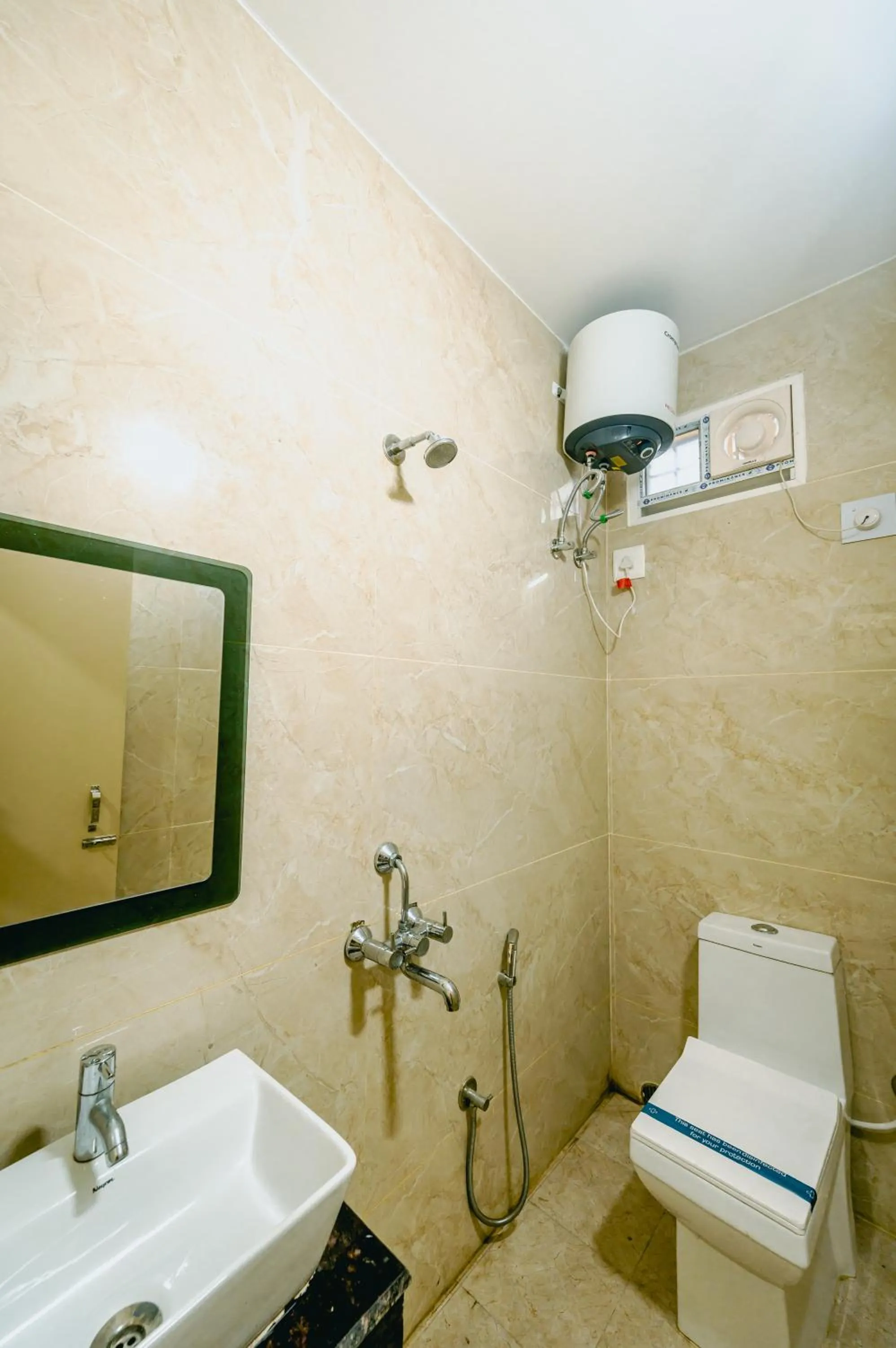 Toilet in Livotel Premium Hotel