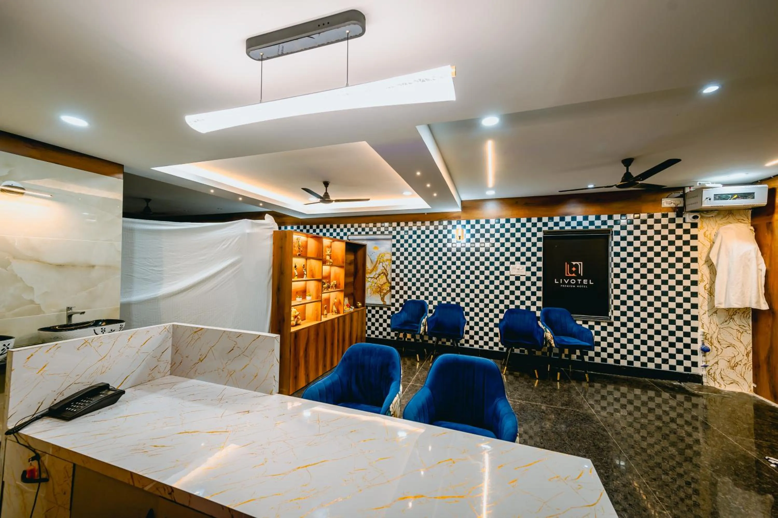 Lobby or reception in Livotel Premium Hotel