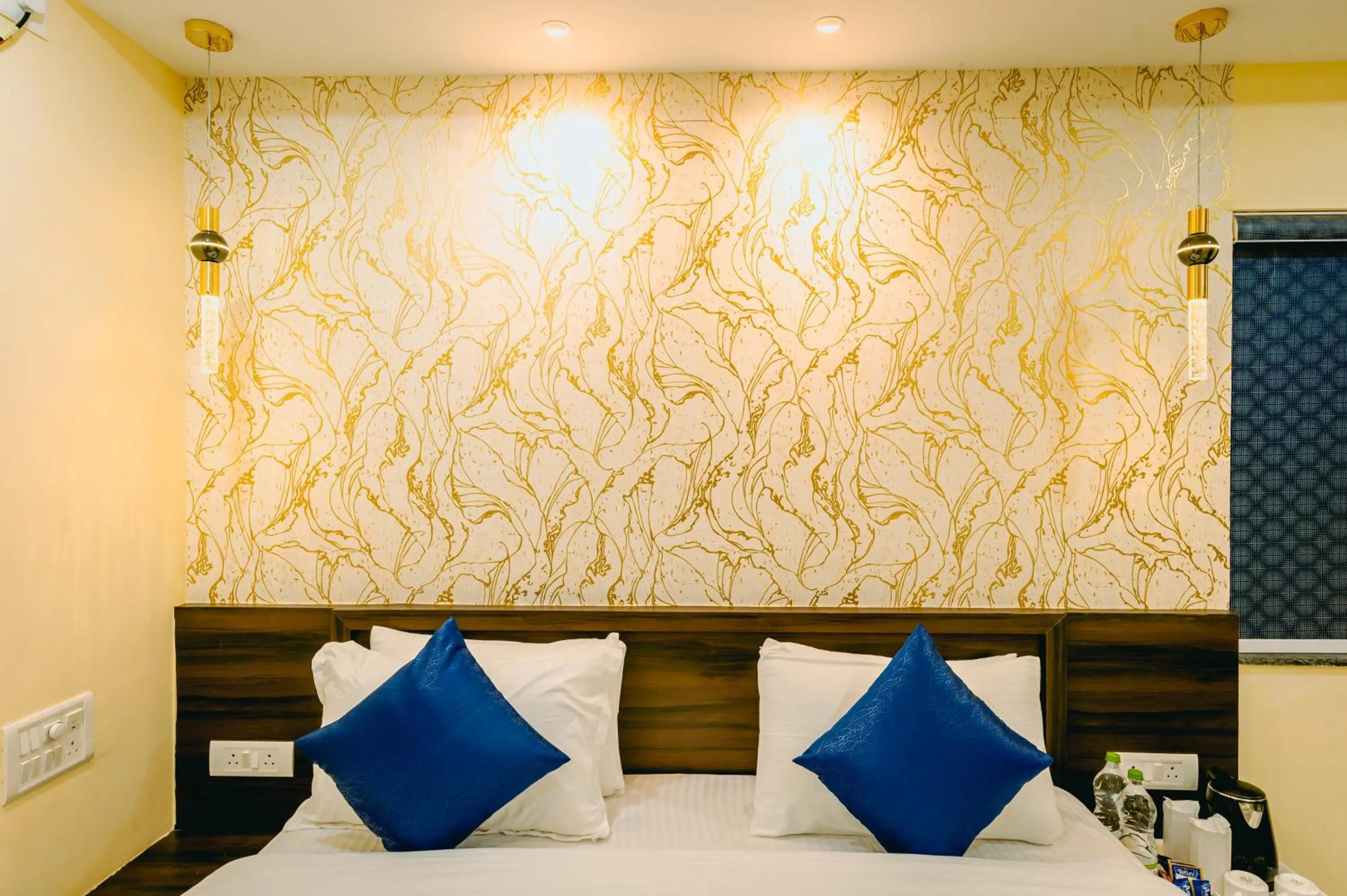 Bed in Livotel Premium Hotel