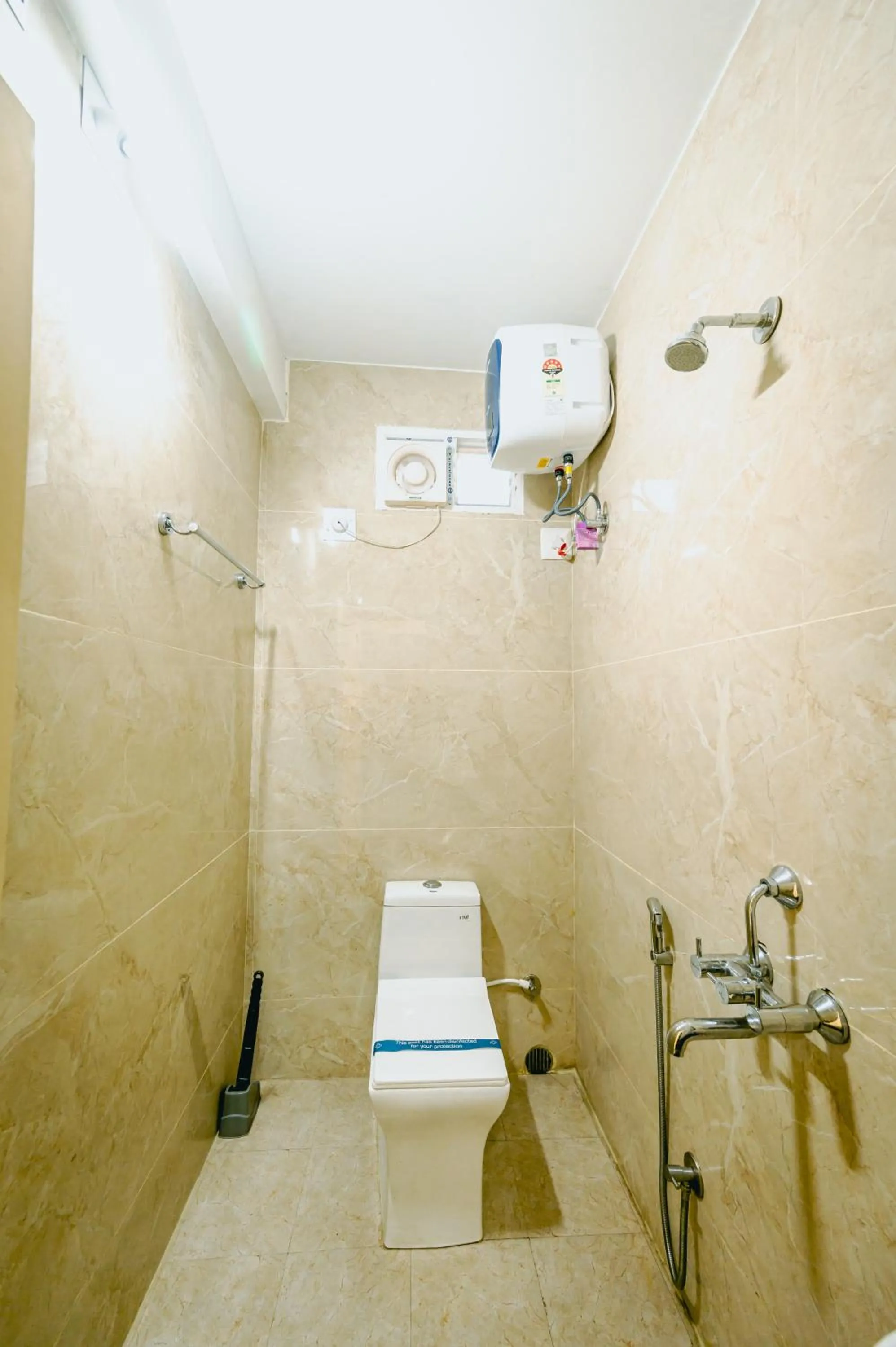 Toilet in Livotel Premium Hotel